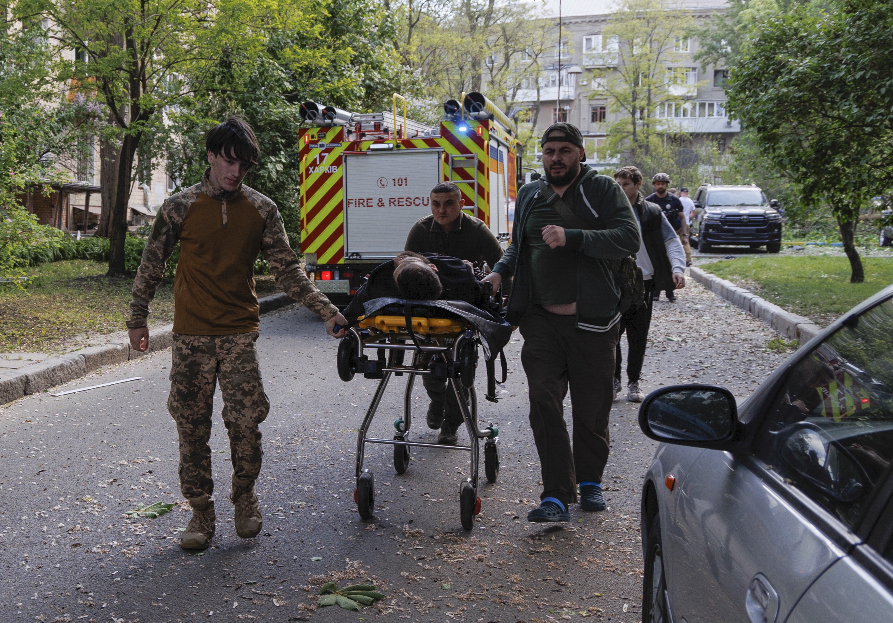 Medics evacuate an injured ma