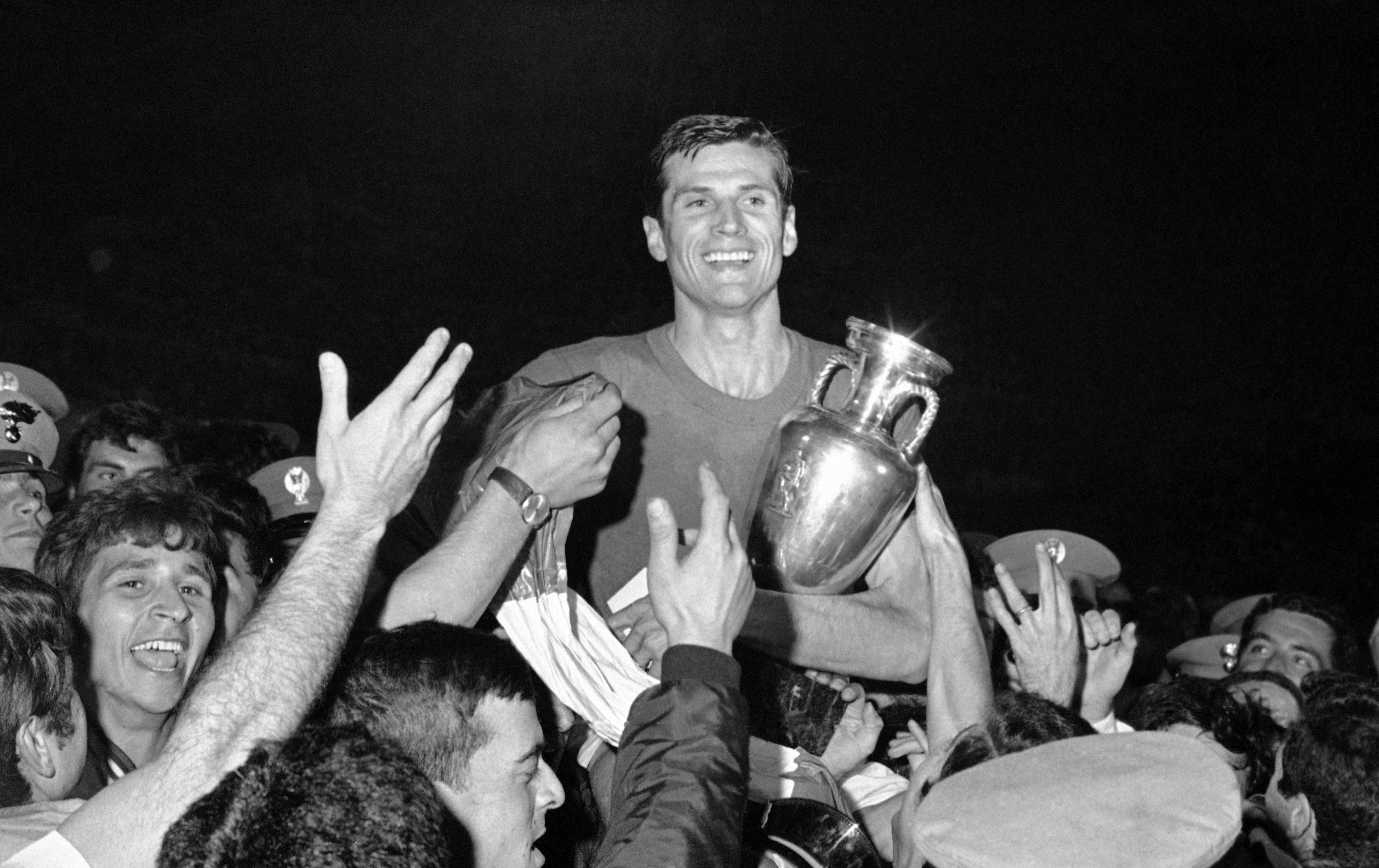 Giacinto Facchetti, captain of the Italian football team, is carried shoulder high by teammates after their 2-0 win over Yugoslavia in the final of the European Nations Cup tournament, or Euro 1968, in the Olympic Stadium, in Rome, on June 10, 1968