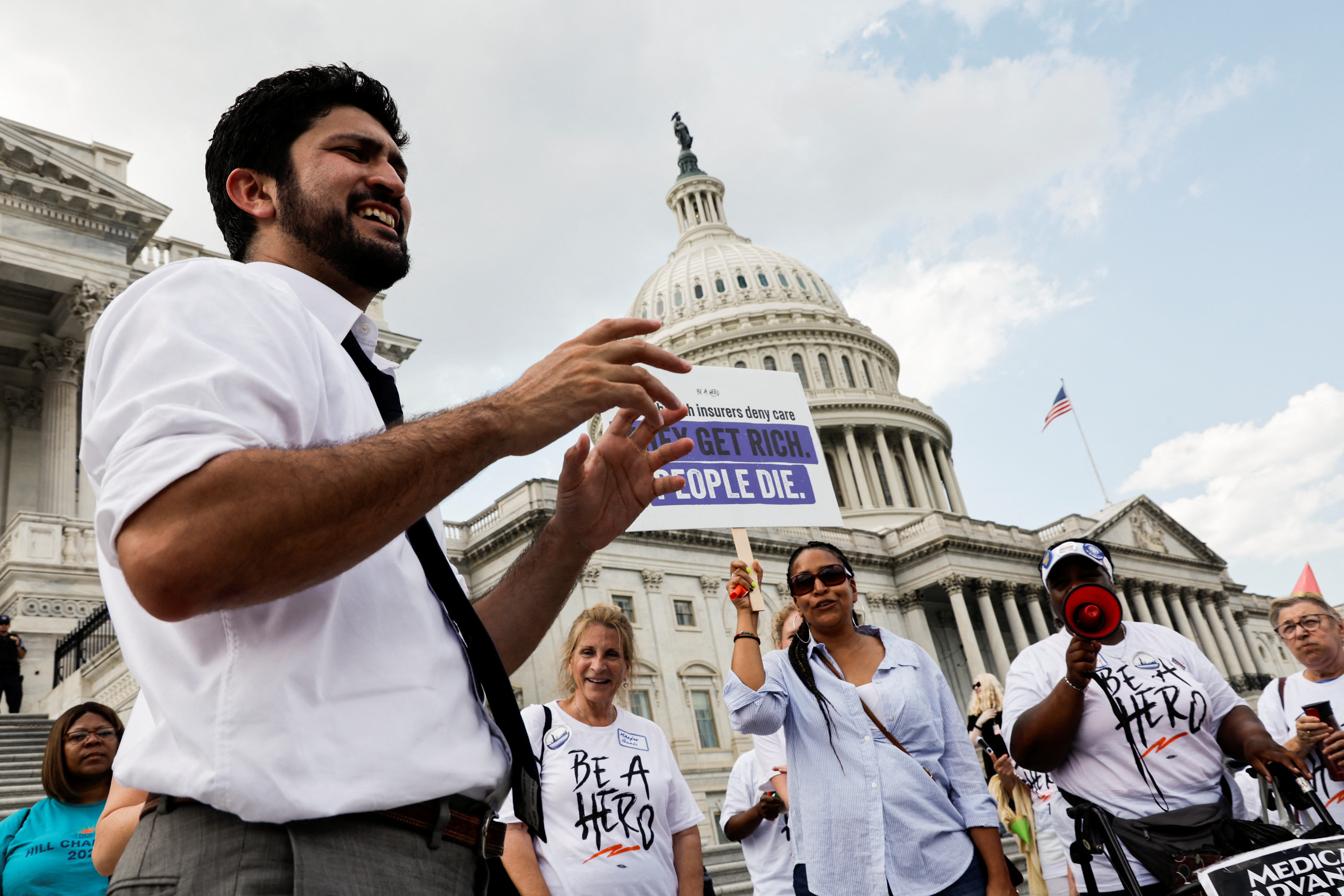 Representative Greg Casar stands in front of the Capitol dome with fellow demonstrators.