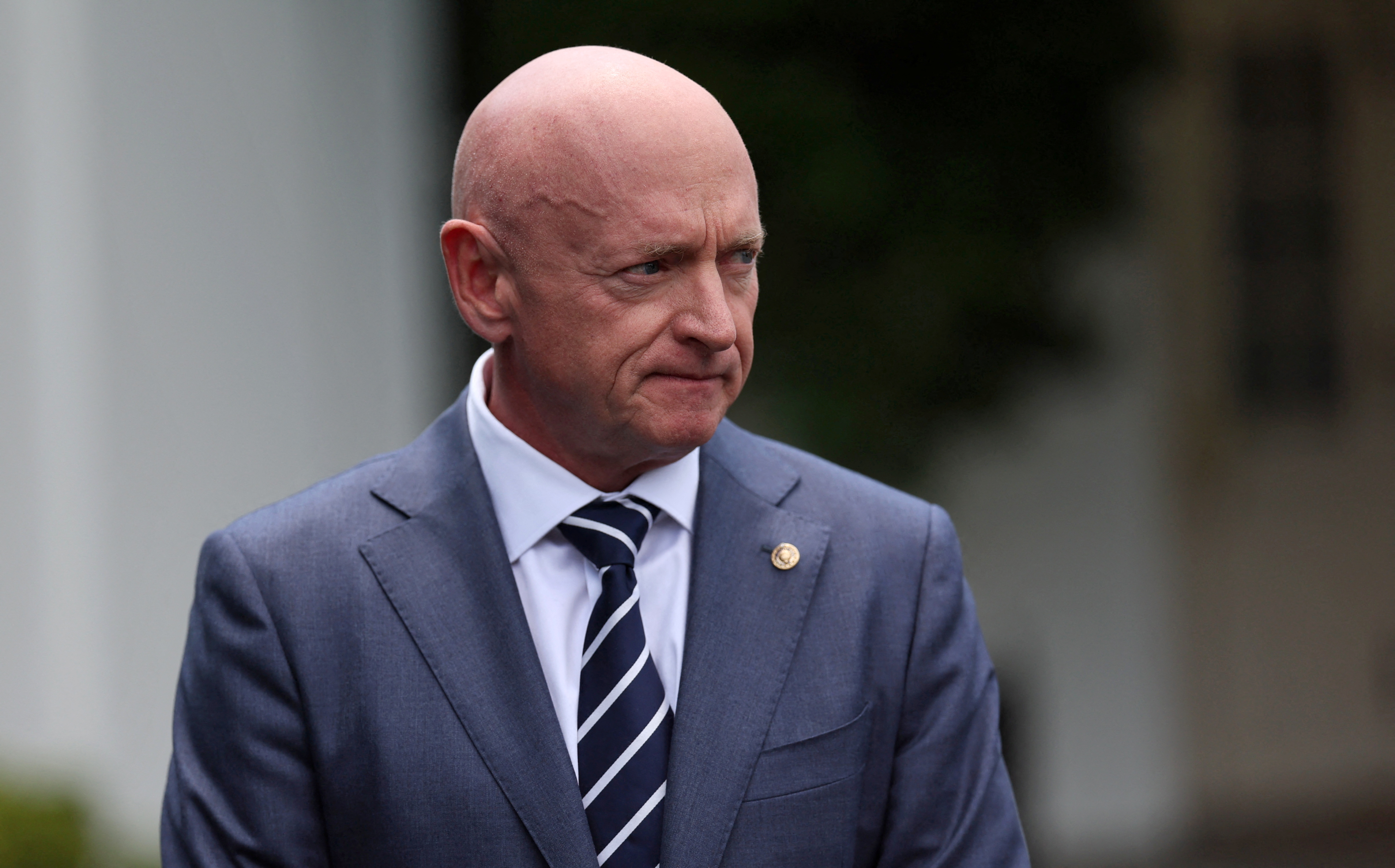US Sen. Mark Kelly (D-AZ) speaks to members of the news media 