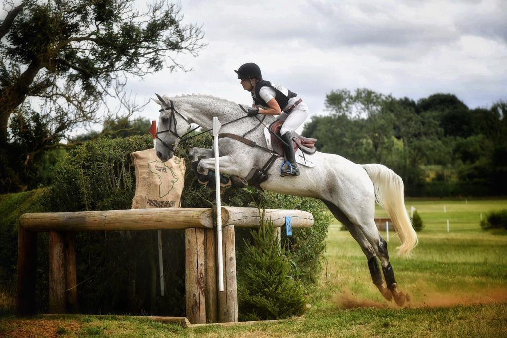 Nour Slaoui and Cash in Hand clear a fence during a training session [Courtesy of Nour Slaoui]