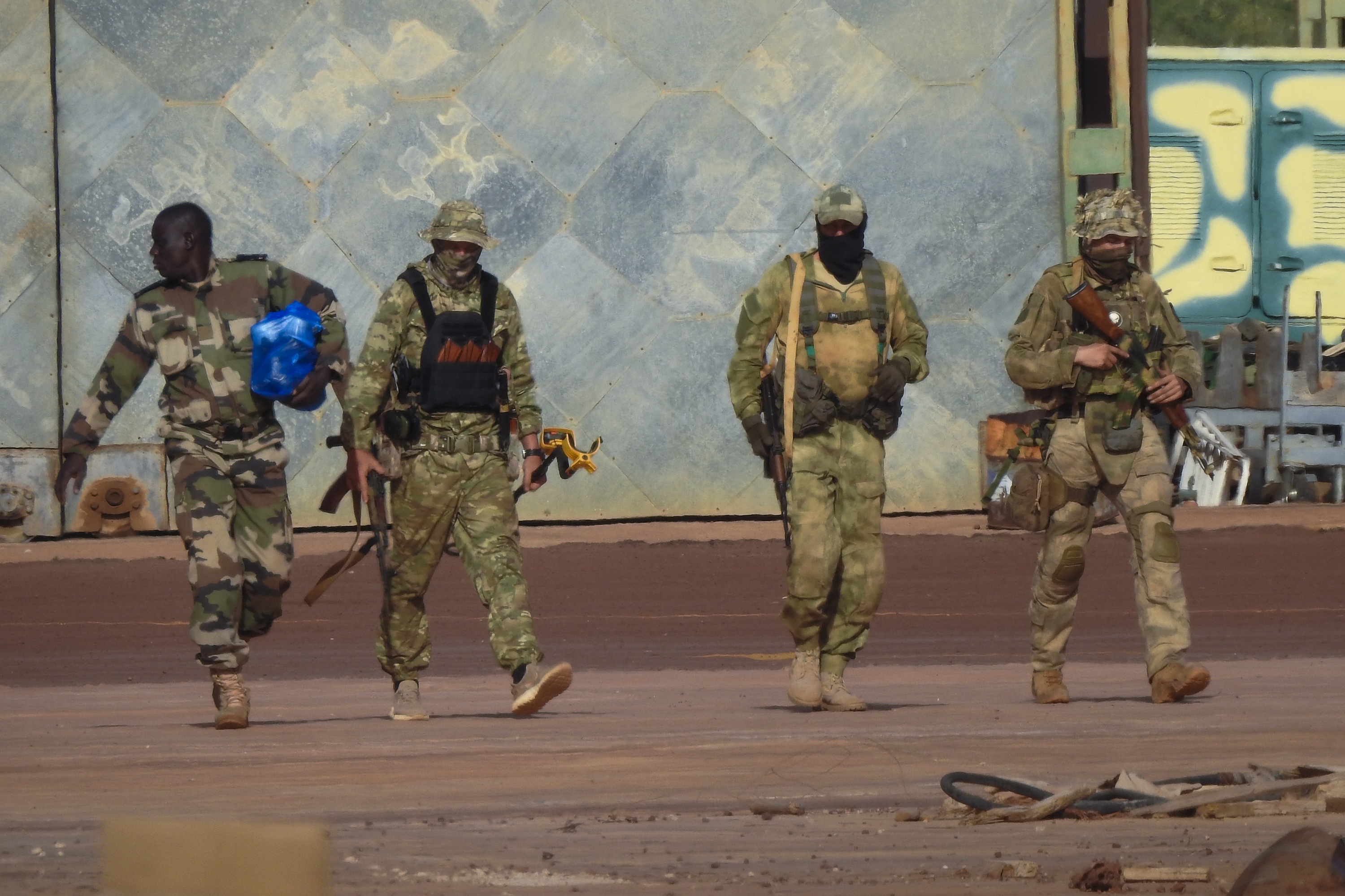 An undated photograph provided by the French military shows three Russian mercenaries in northern Mali [French Army via AP]