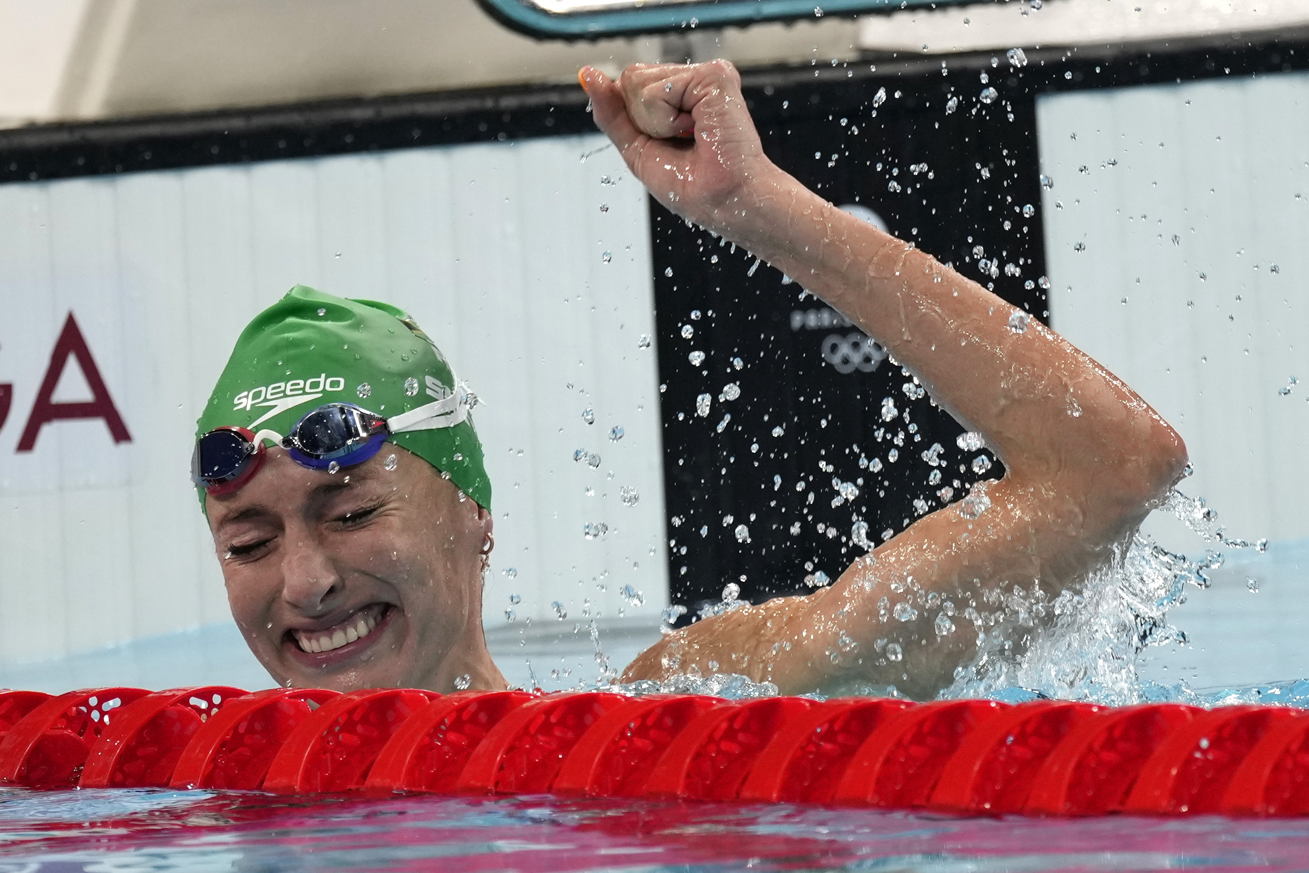 South Africa’s Tatjana Smith celebrates after winning the women’s 100m breaststroke final