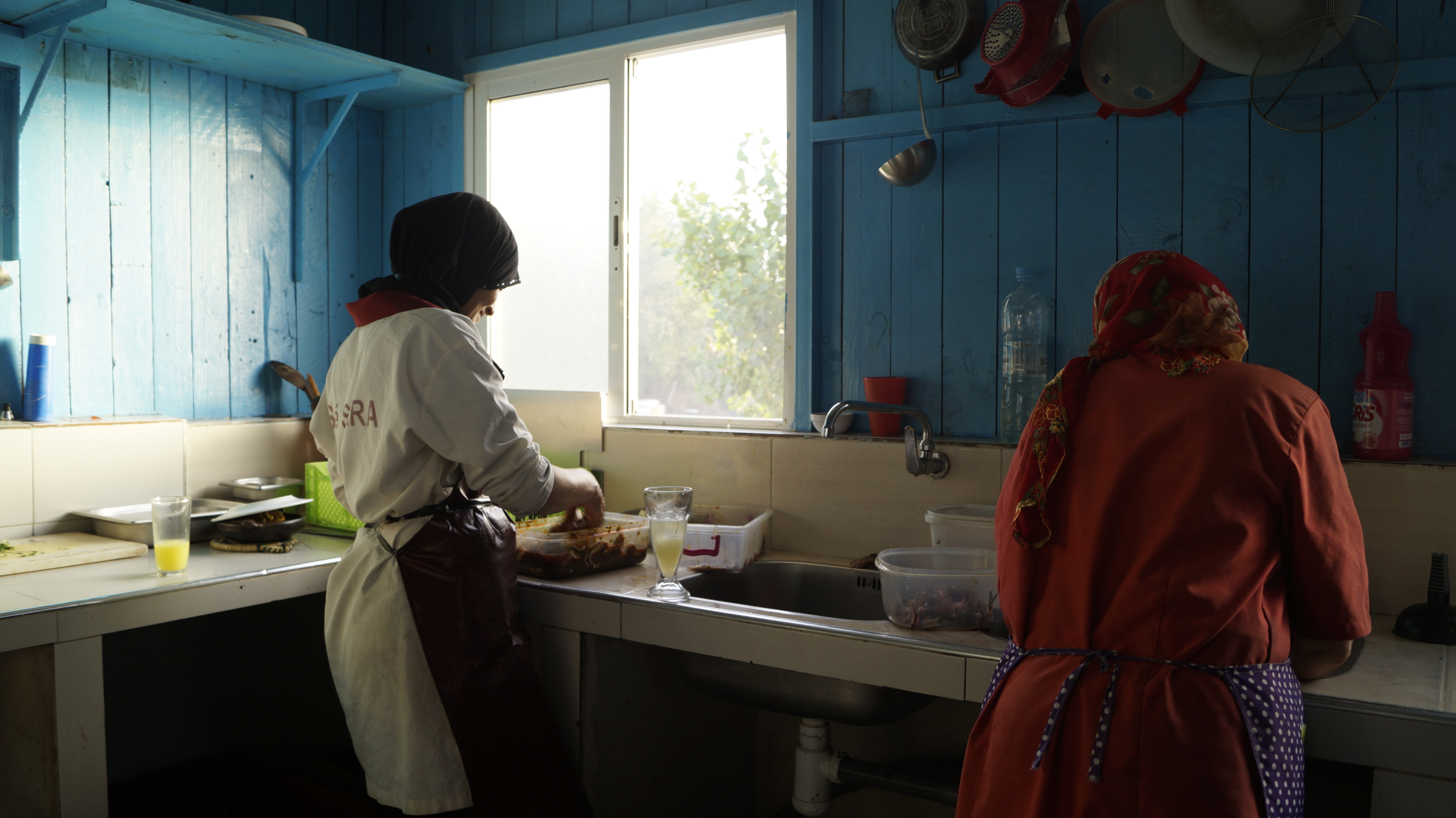 Aseya, Ilyas’s mother, works during the summer in the kitchen of a restaurant by the sea for 14 hours a day, earning 100 dirhams