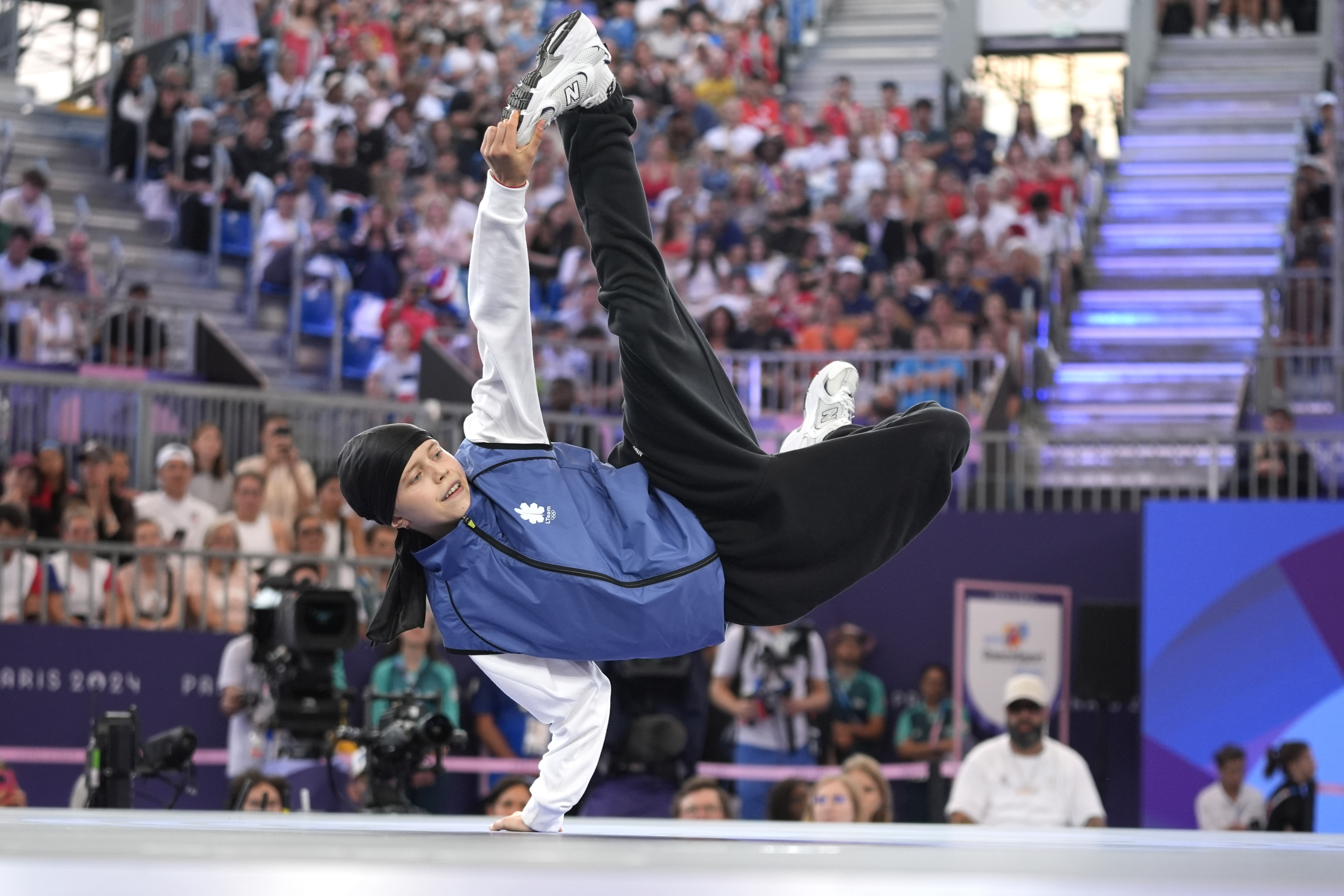 Lithuania's Dominika Banevic, known as B-Girl Nicka, competes during the B-Girls quarterfinals at the breaking competition at La Concorde Urban Park at the 2024 Summer Olympics, Friday, Aug. 9, 2024, in Paris, France. (AP Photo/Frank Franklin)