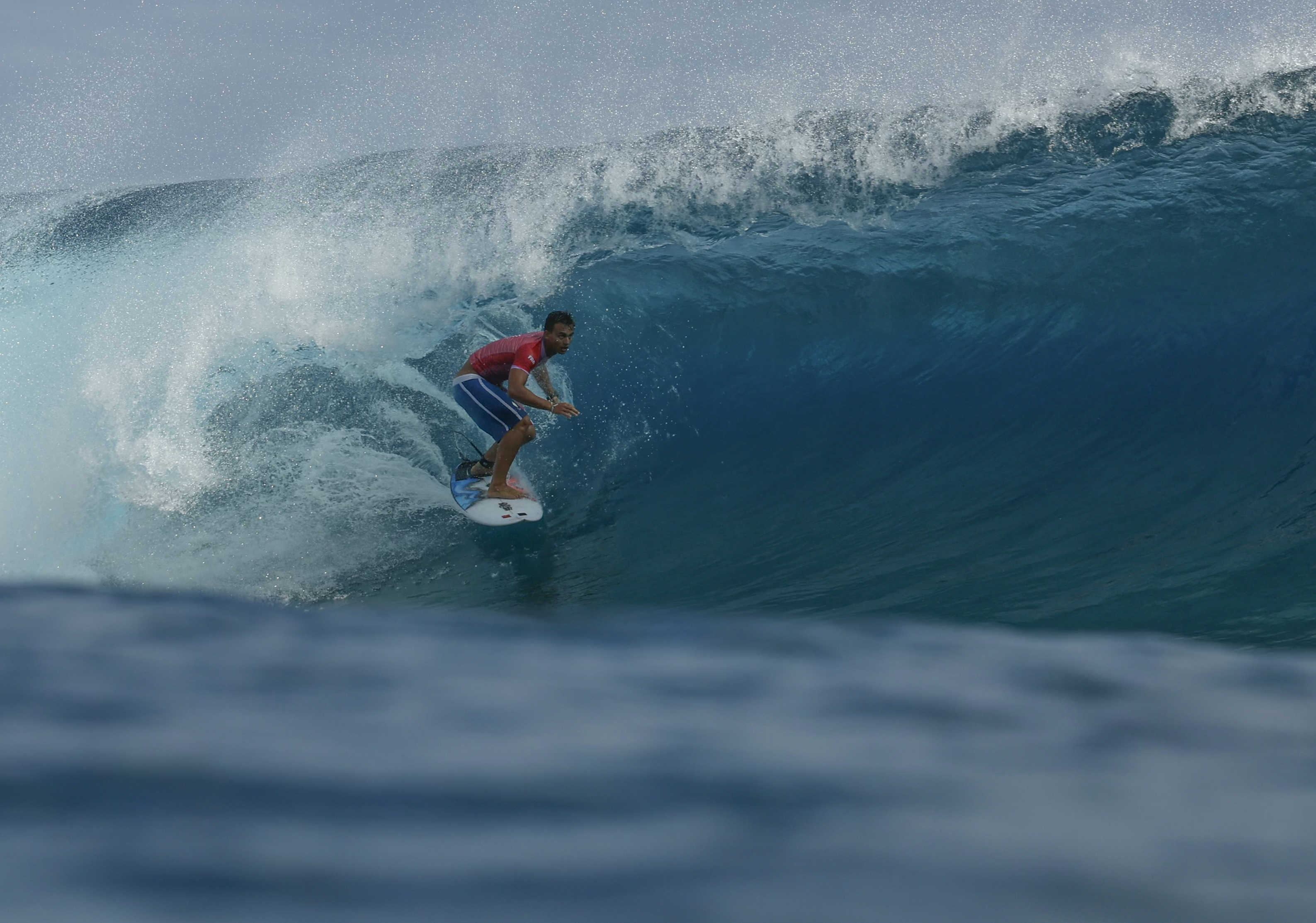 Kauli Vaast of France gets a barrel in the men’s surfing gold medal final at the Paris 2024 Olympic Games on August 5, 2024 in Teahupo’o, on the French Polynesian Island of Tahiti