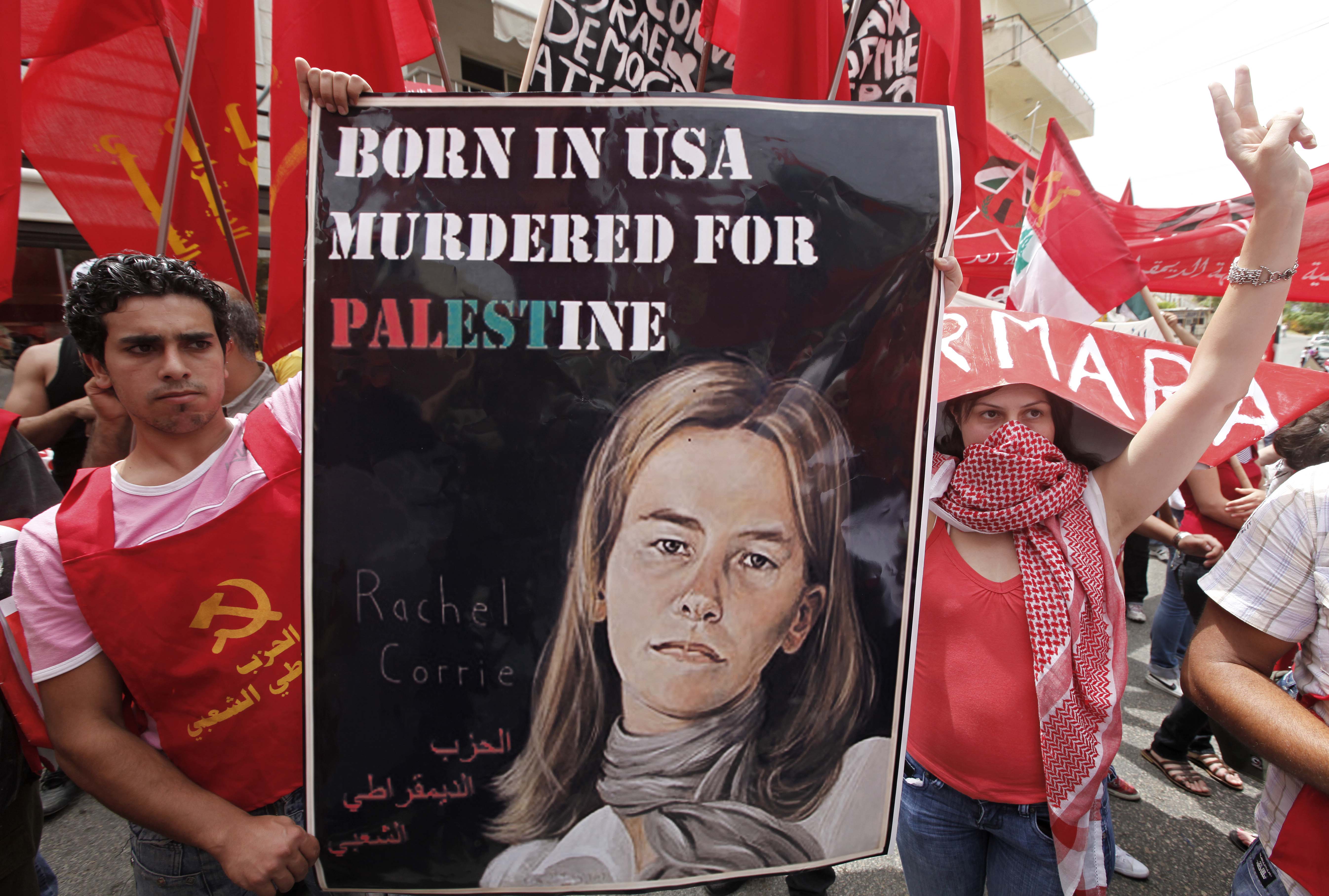 Lebanese protesters with a poster of Rachel Corrie during a demonstration near the US embassy in Beirut in 2010