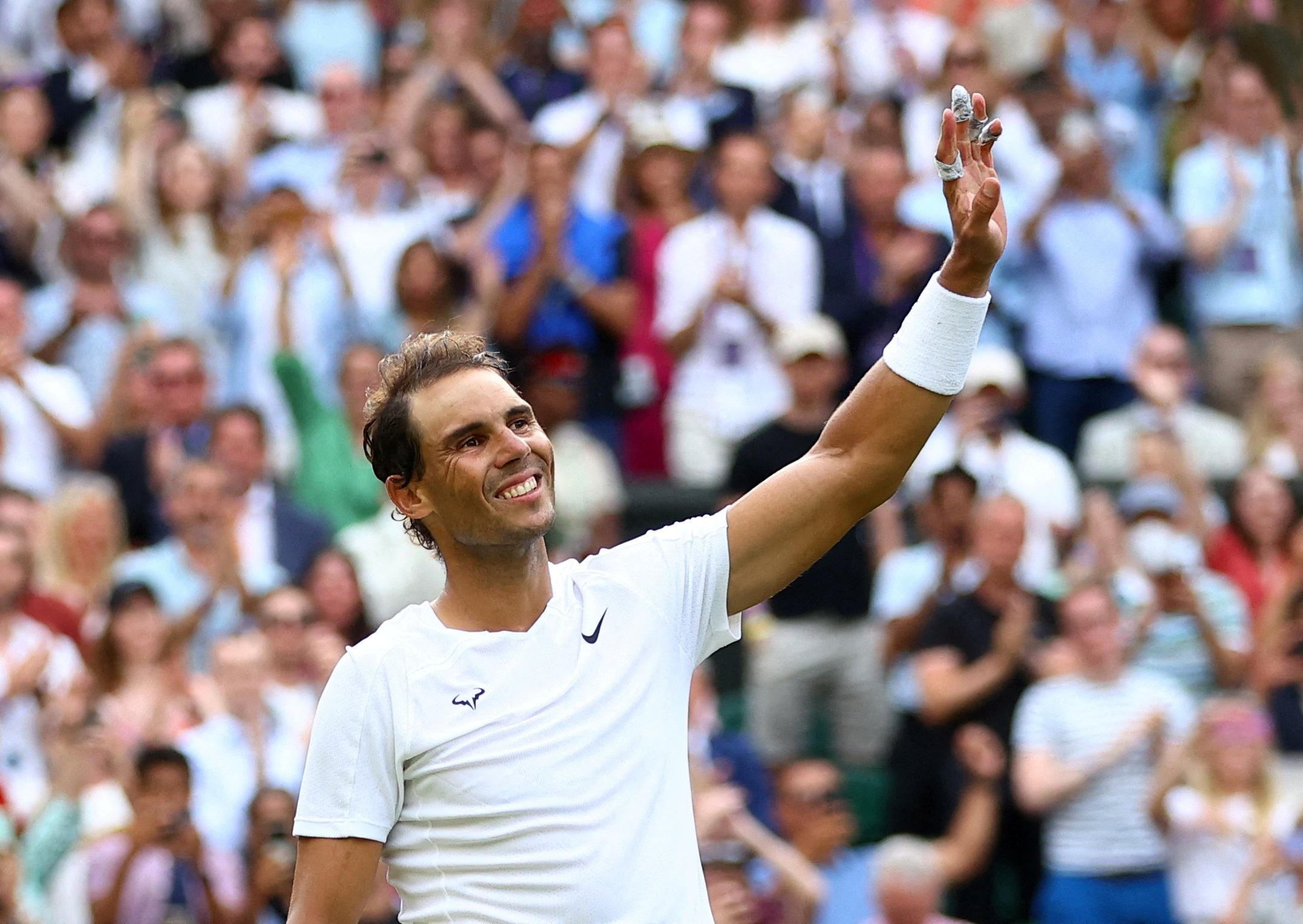 FILE PHOTO: Tennis - Wimbledon - All England Lawn Tennis and Croquet Club, London, UK - July 6, 2022. Spain's Rafael Nadal celebrates winning his quarter final match against Taylor Fritz of the US. REUTERS/Hannah Mckay/File Photo
