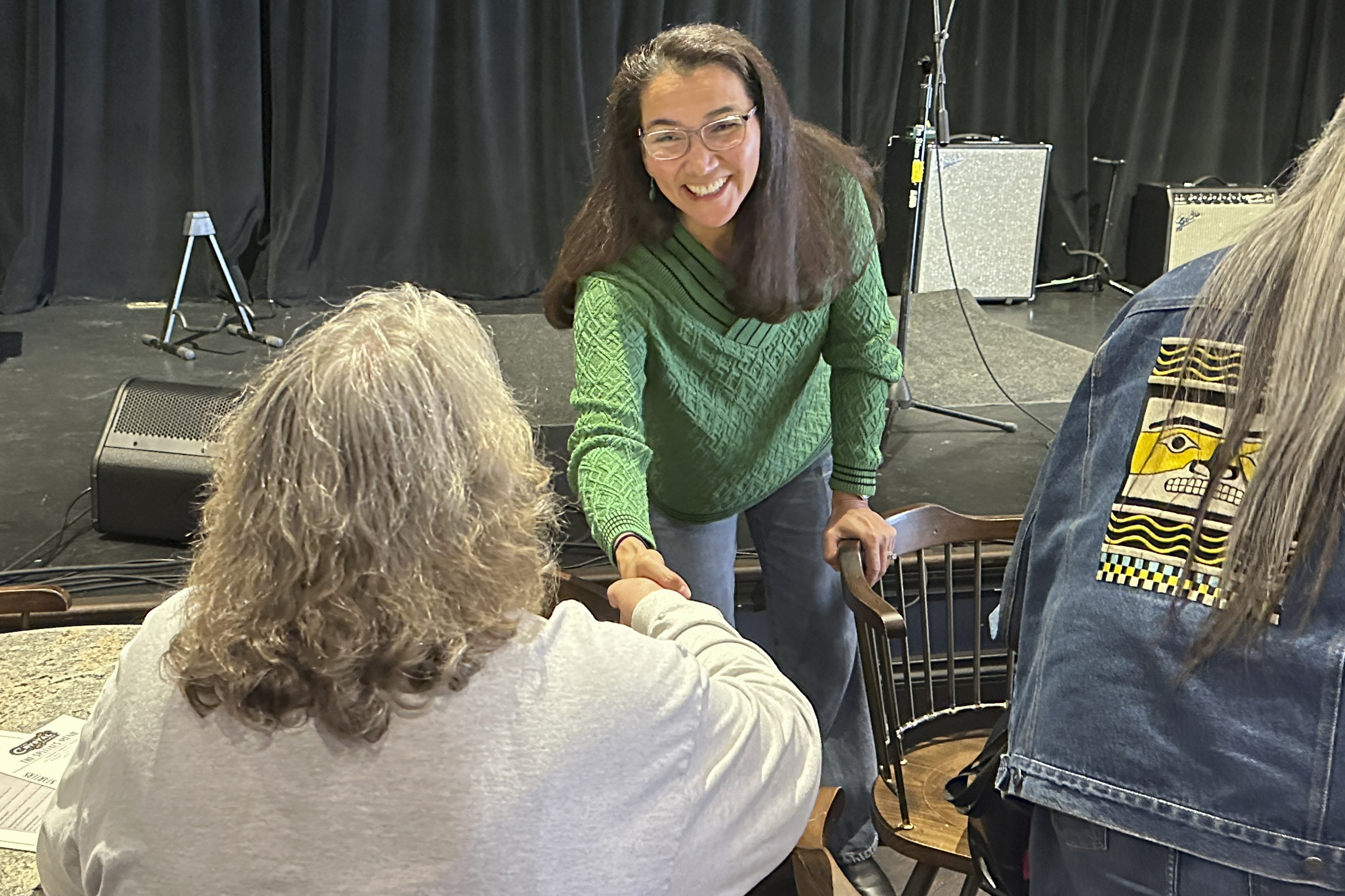 Representative Mary Peltola shakes hands at a campaign event in Juneau, Alaska, on August 3