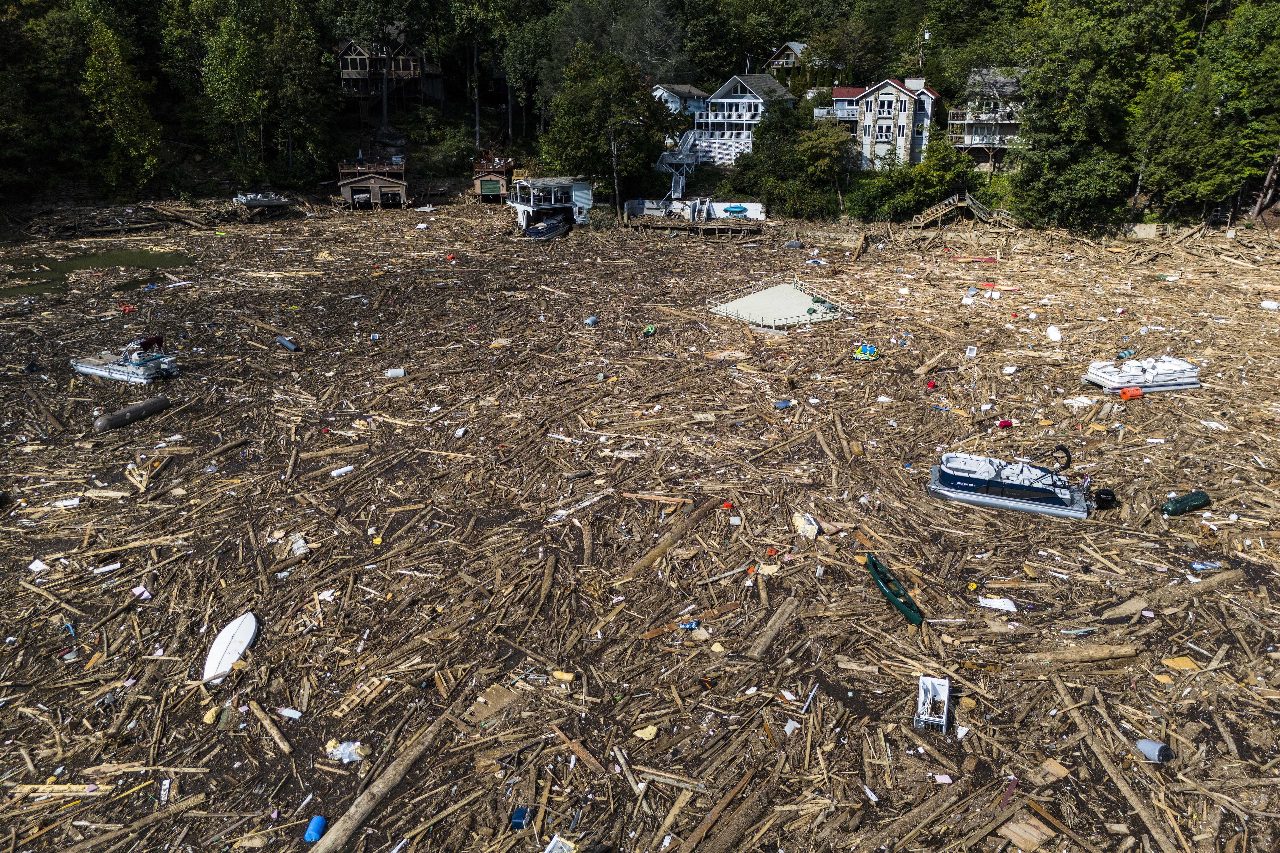 Debris is strewn on the lake in the aftermath of Hurricane Helene, October 2, 2024, in Lake Lure, North Carolina, the United States