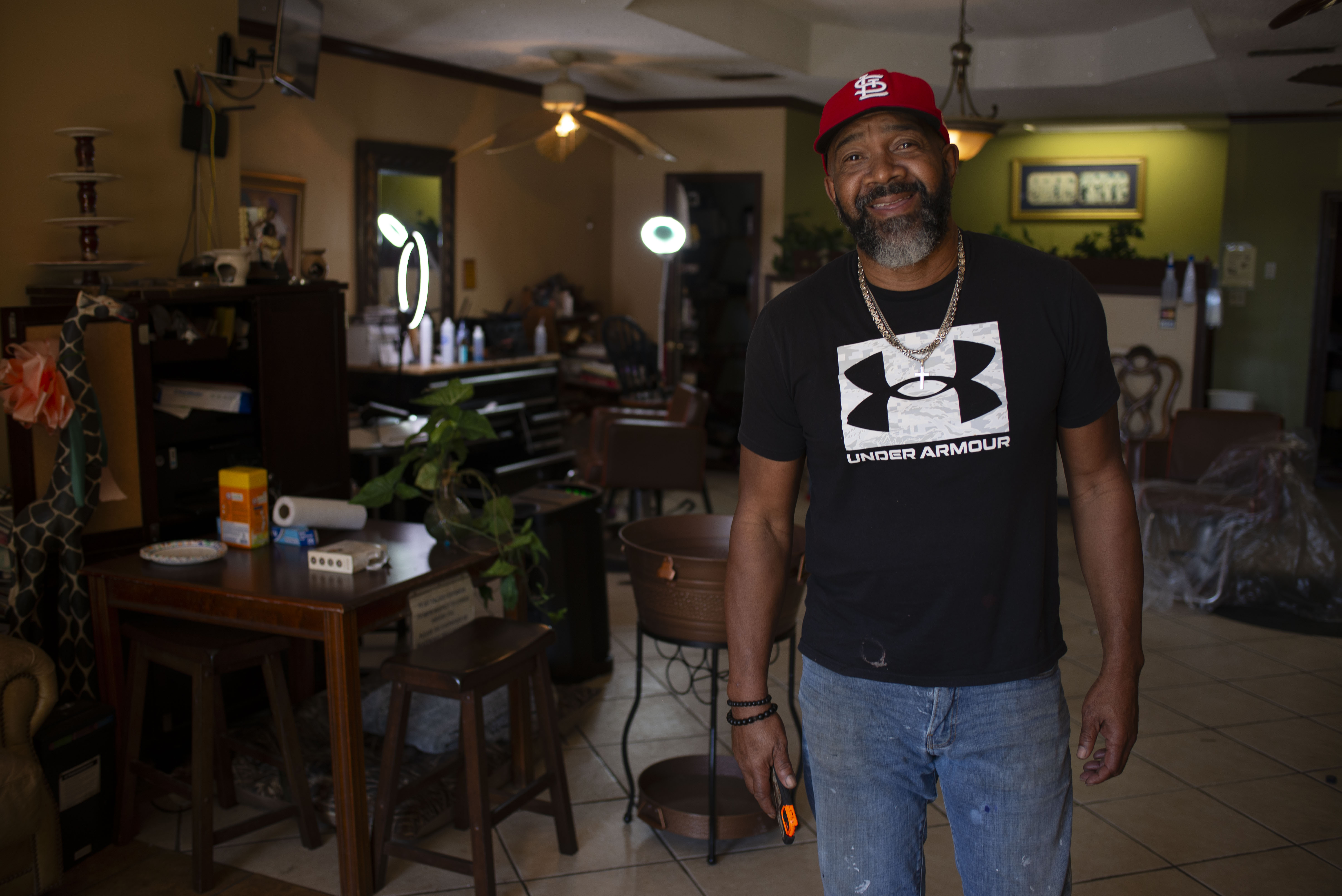 Garrett Milton stands in his salon in downtown Fort Valley, Georgia