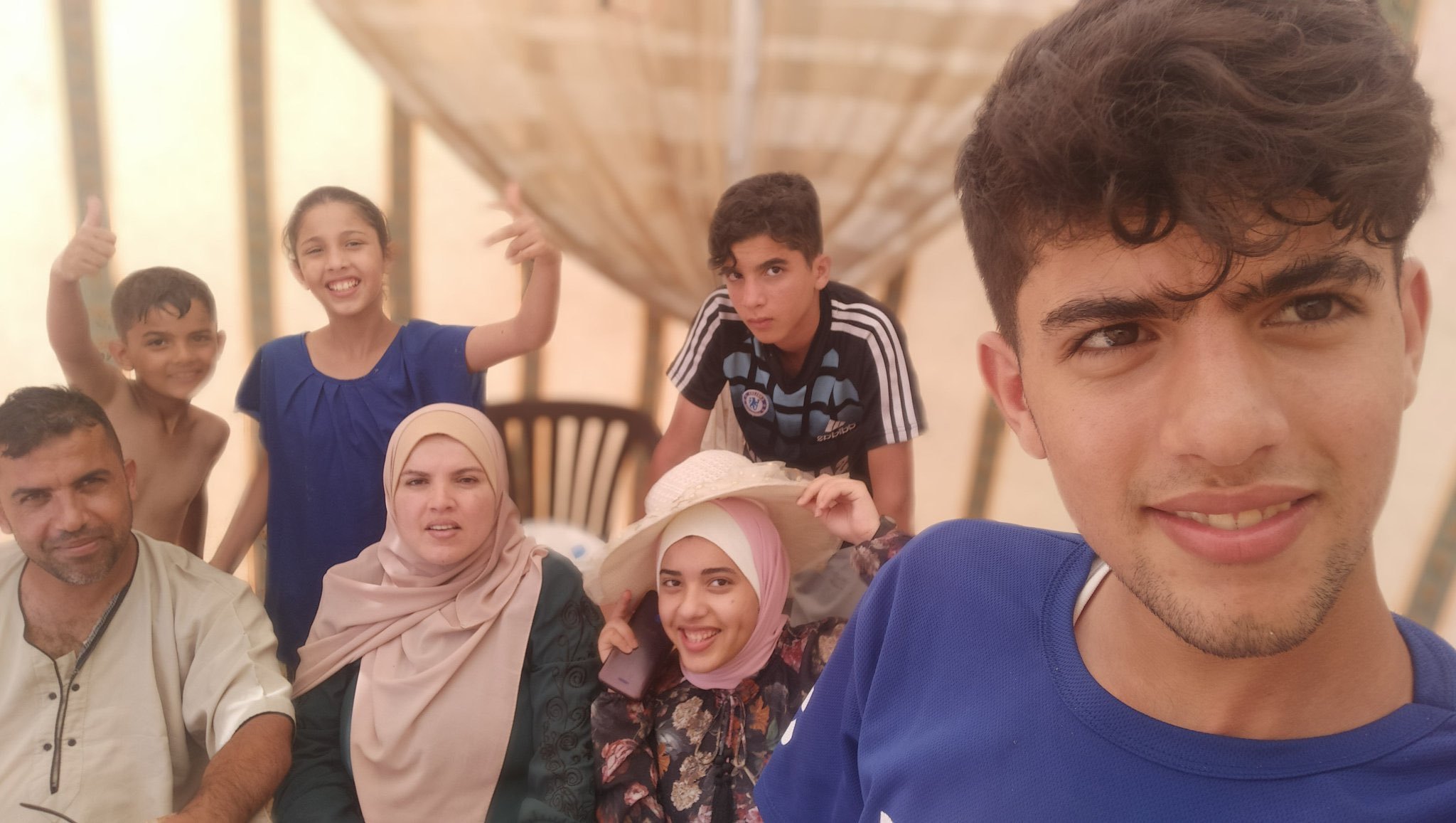 Shaban al-Dalou with his parents and siblings [Courtesy of the al-Dalou family]