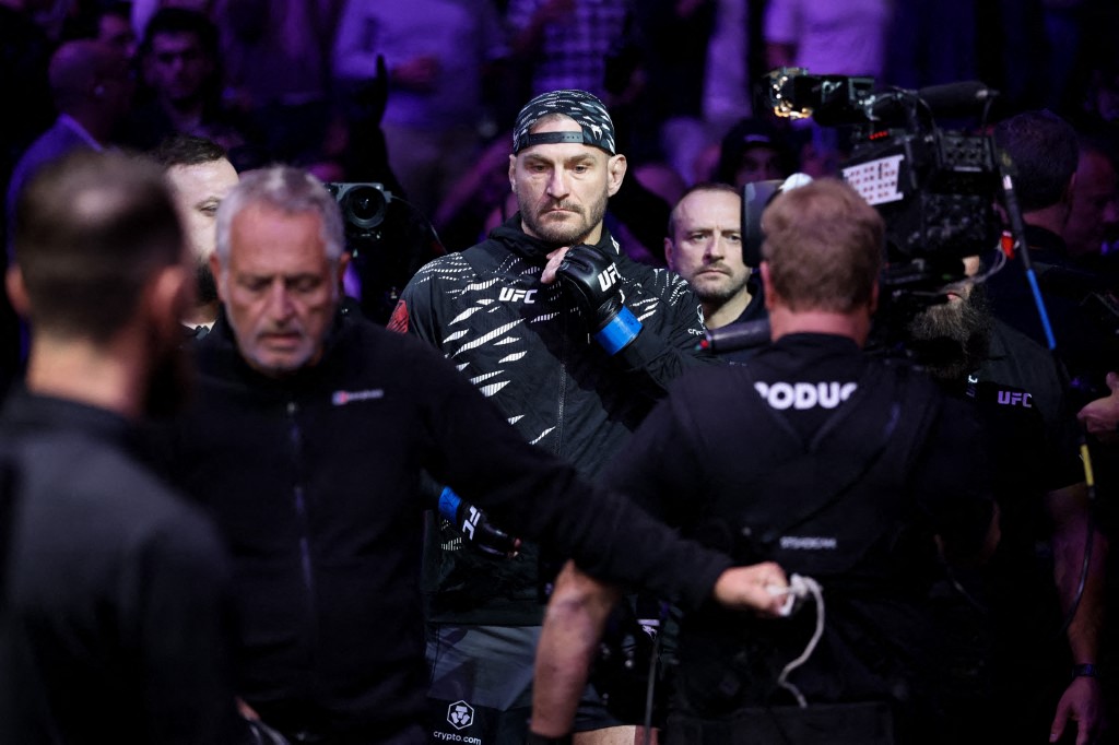Jon Jones sends Stipe Miocic into retirement in front of Trump