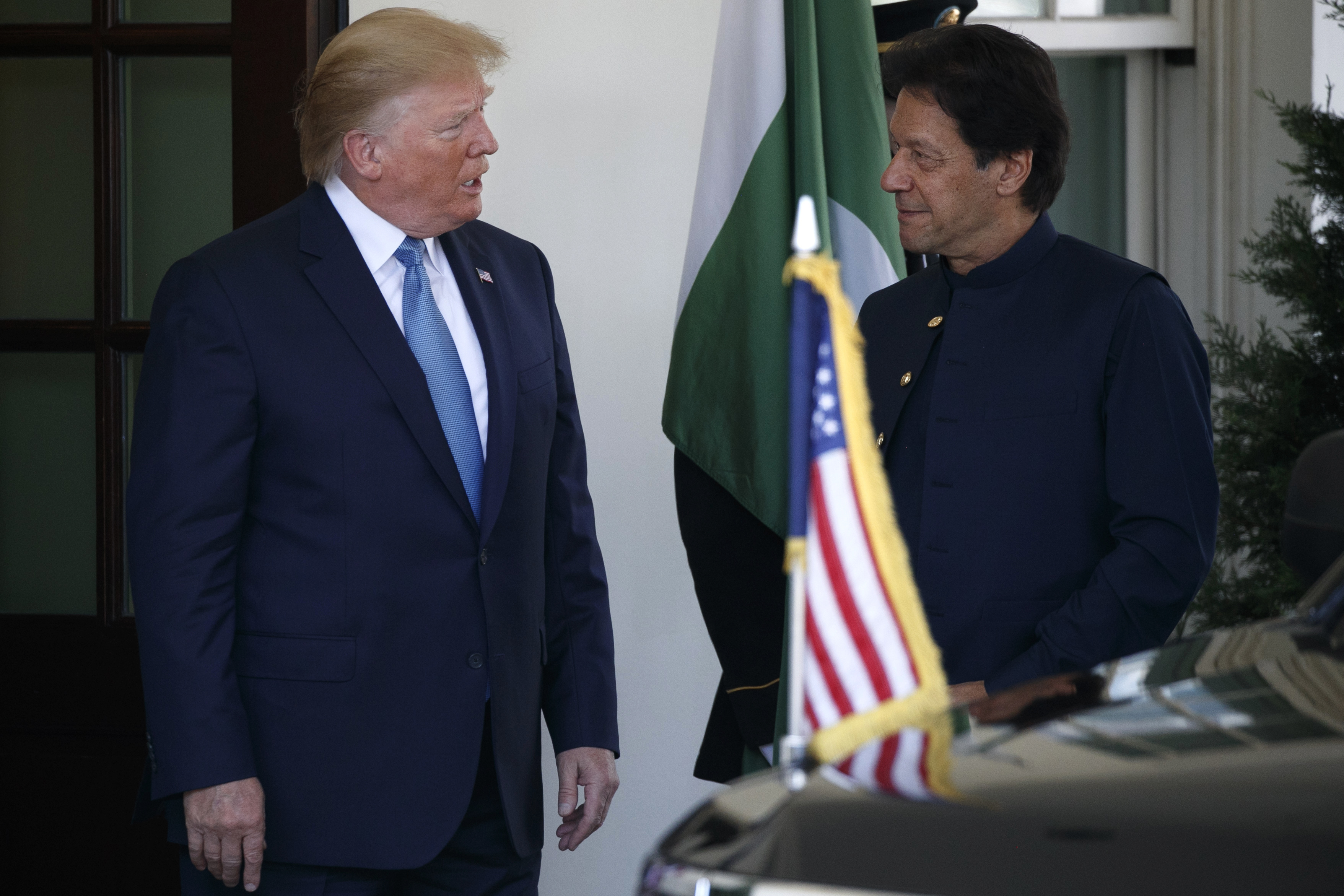 US President Donald Trump greets Pakistan's Prime Minister Imran Khan