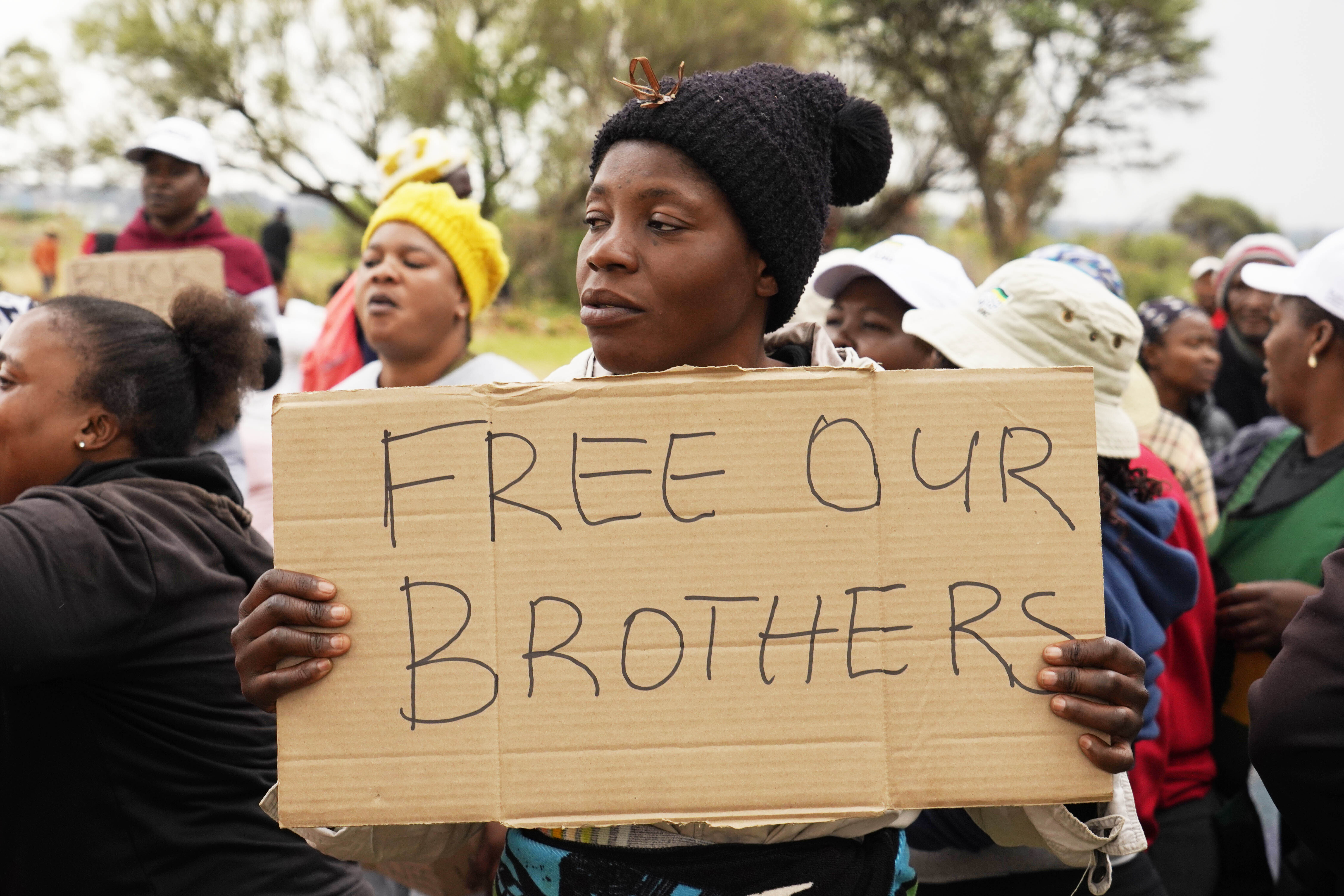 Relatives and friends protest near a gold mine shaft where illegal miners are trapped in Stilfontein, South Africa, November 15, 2024