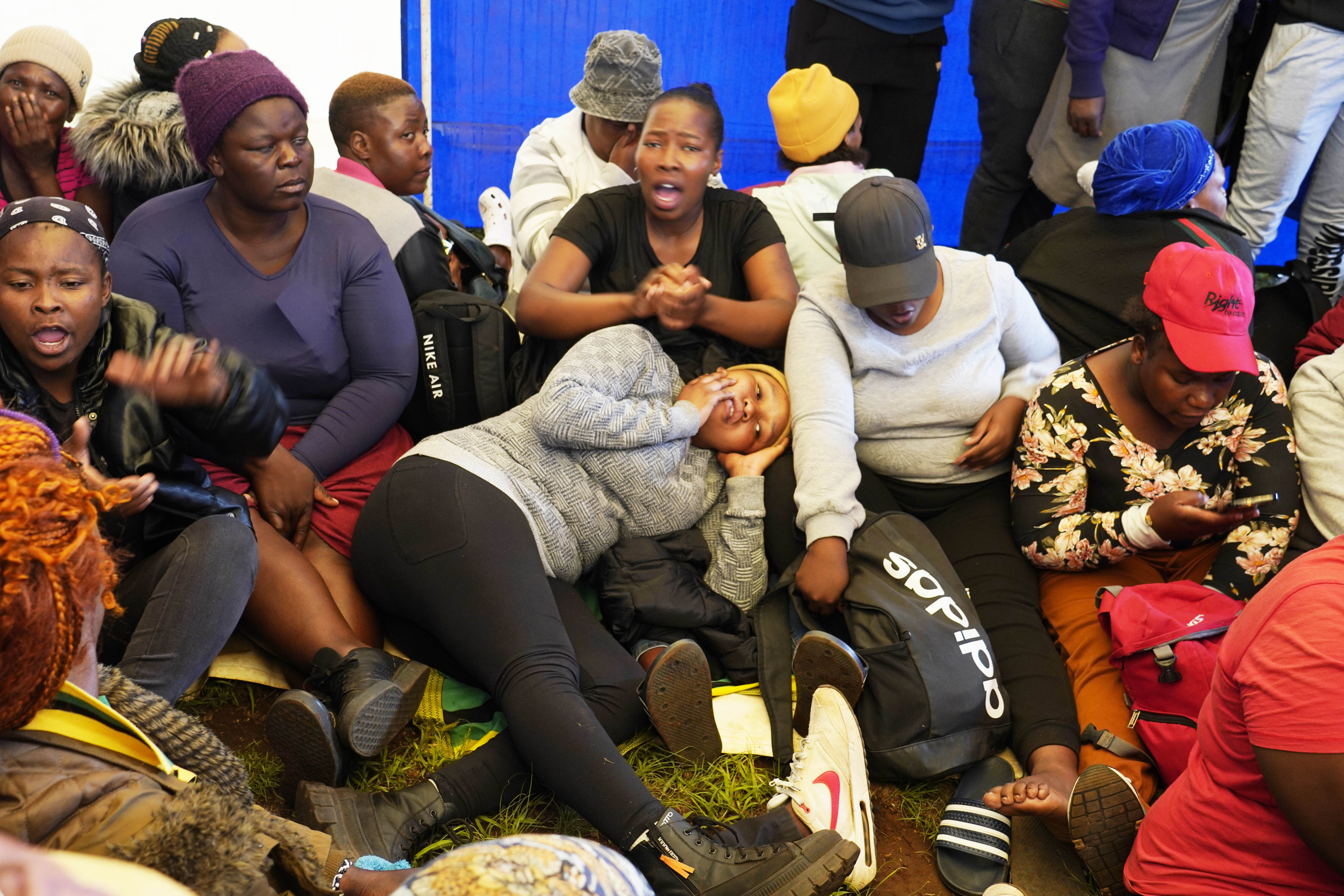 Relatives and friends wait for news near a reformed gold mineshaft where unauthorised miners are trapped in Stilfontein, South Africa, Friday, November 15, 2024