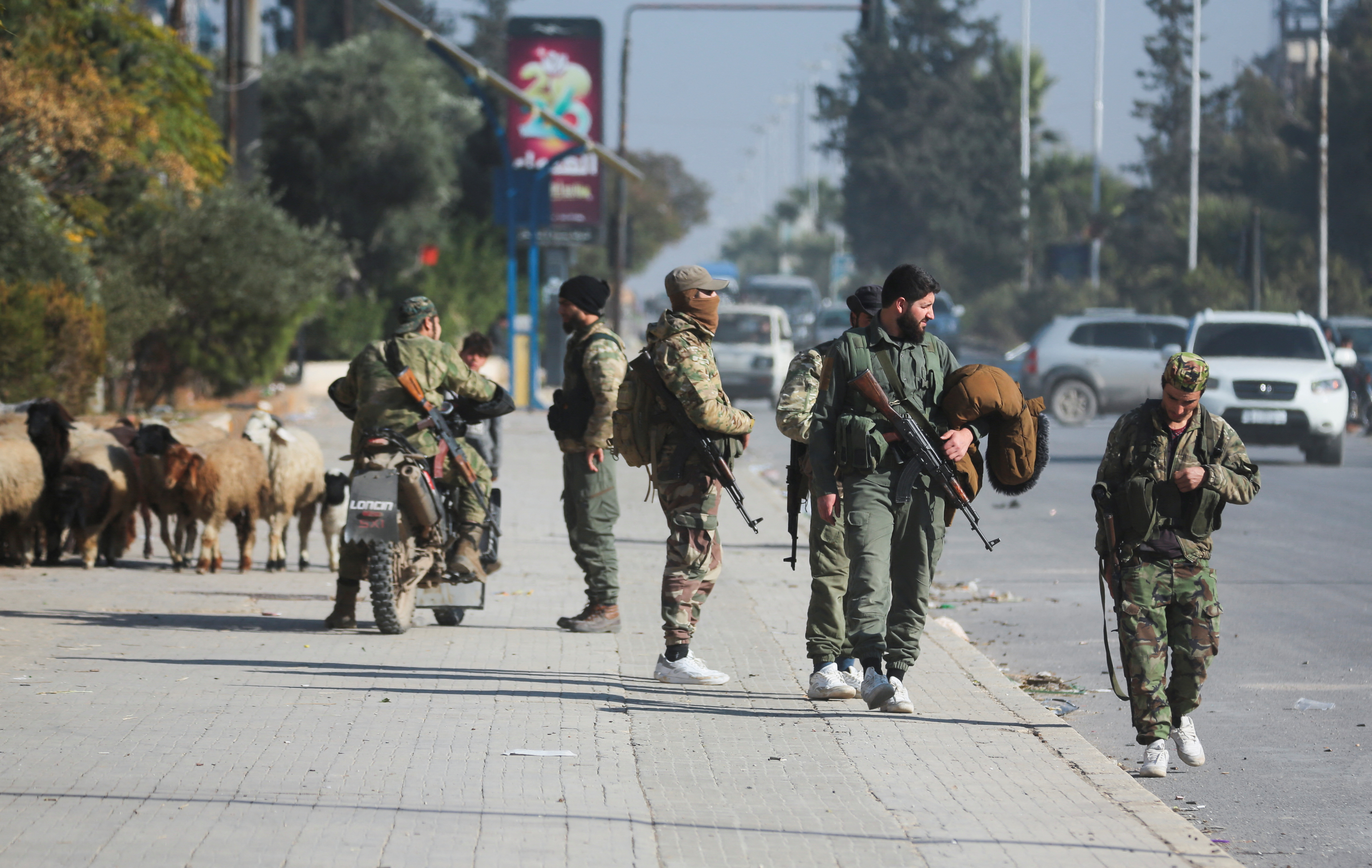 Syrian opposition fighters sweep into Aleppo