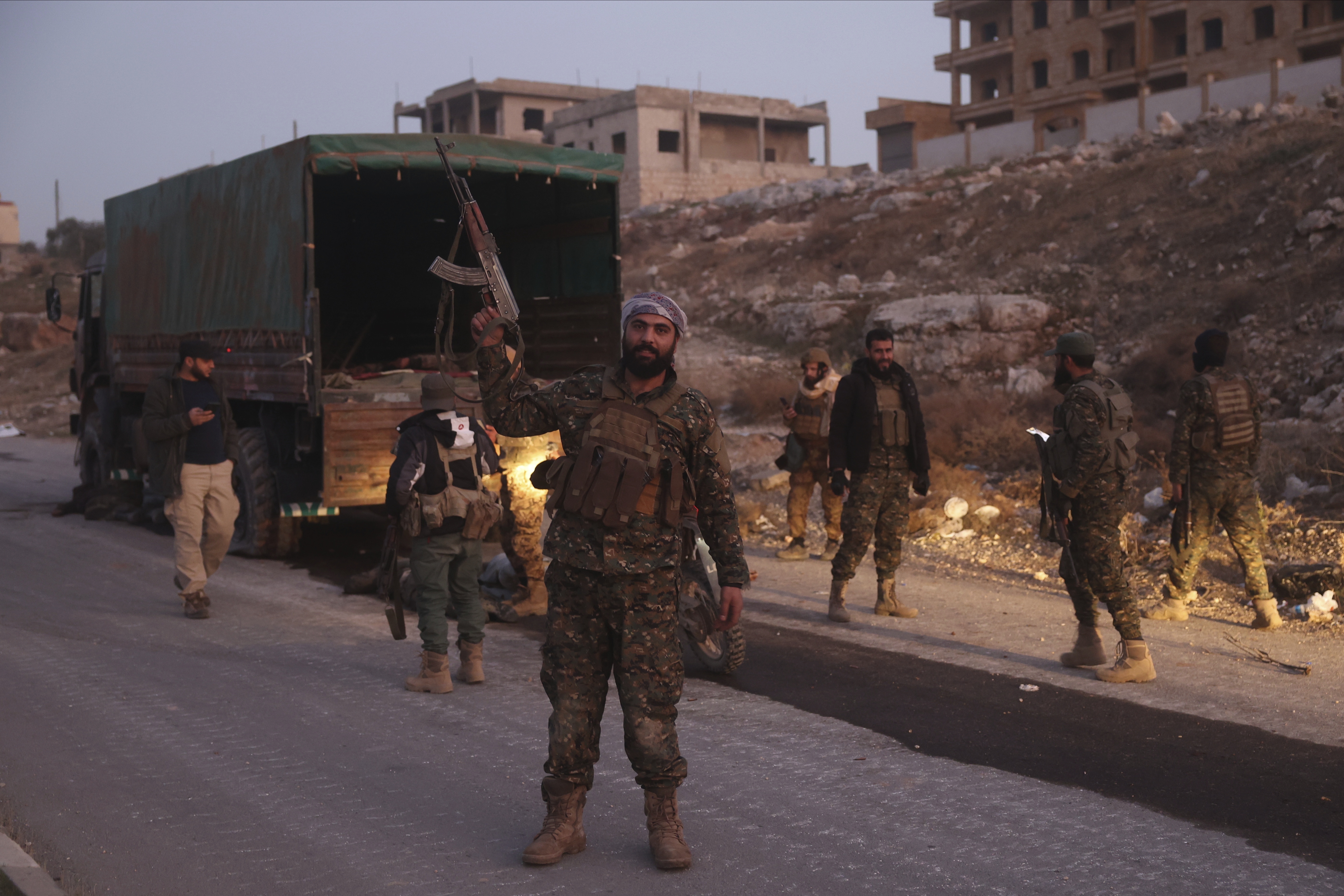 Syrian opposition fighters sweep into Aleppo