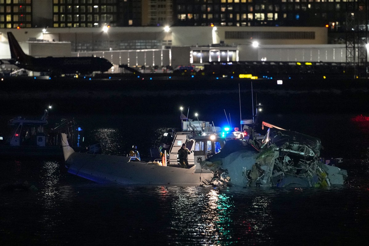 Passenger jet collides with helicopter at Reagan Airport near Washington
