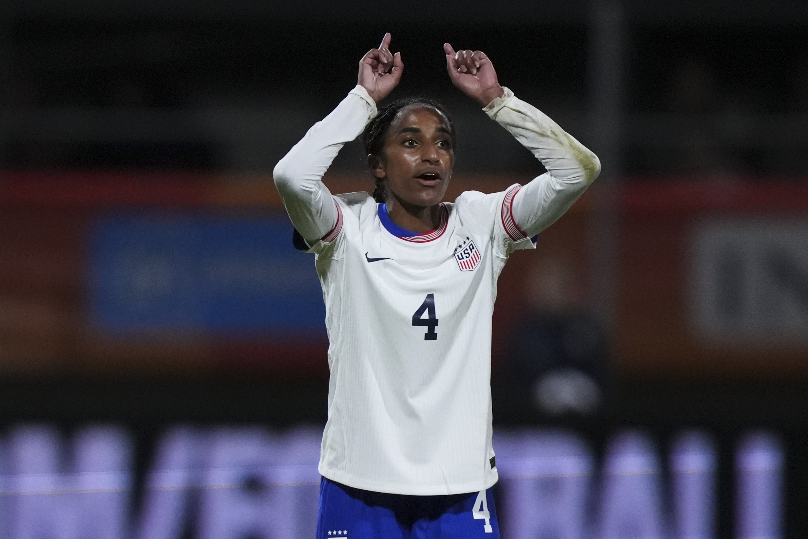 Naomi Girma reacts.