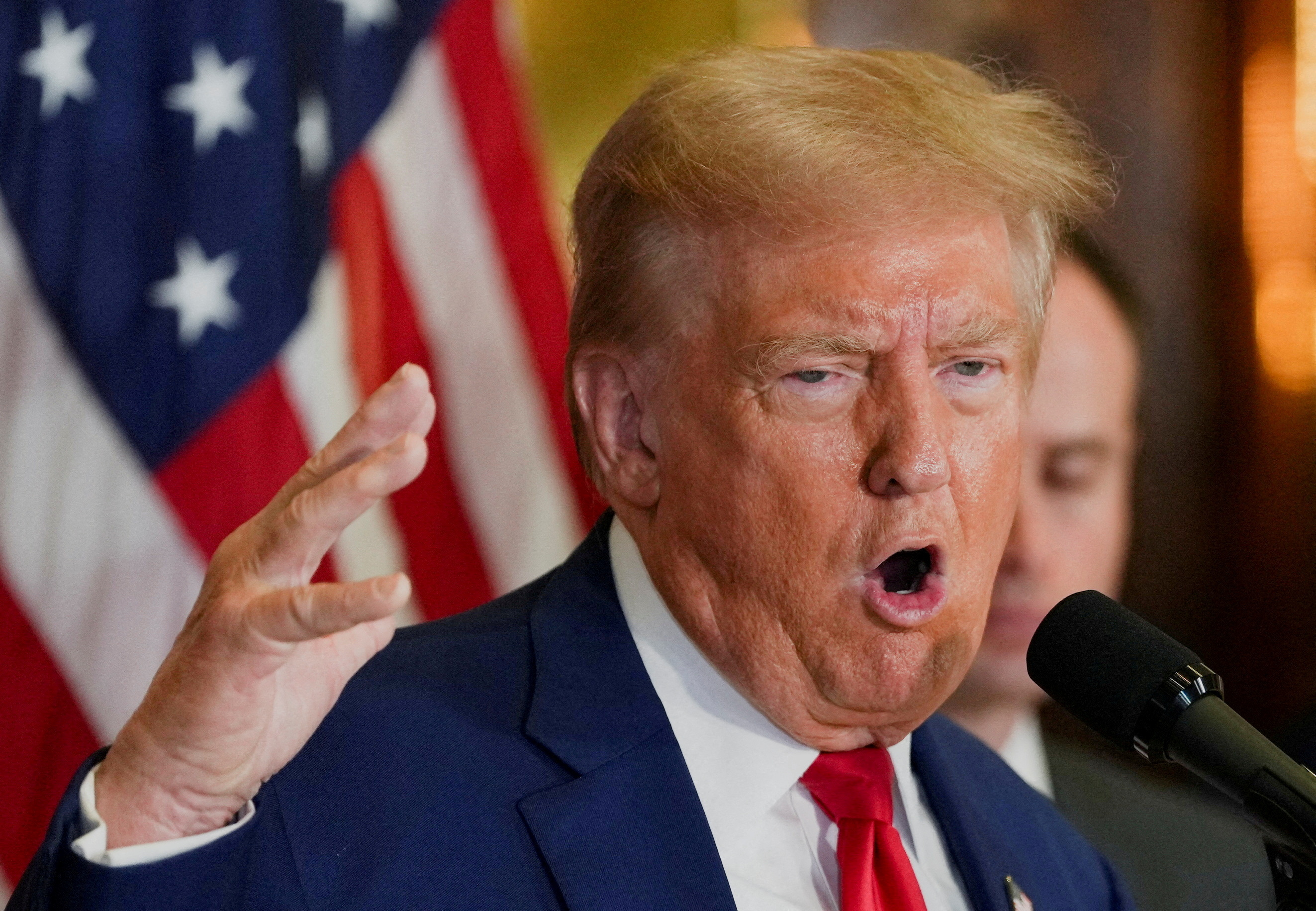  Donald Trump gestures as he speaks during a press conference at Trump Tower in New York City