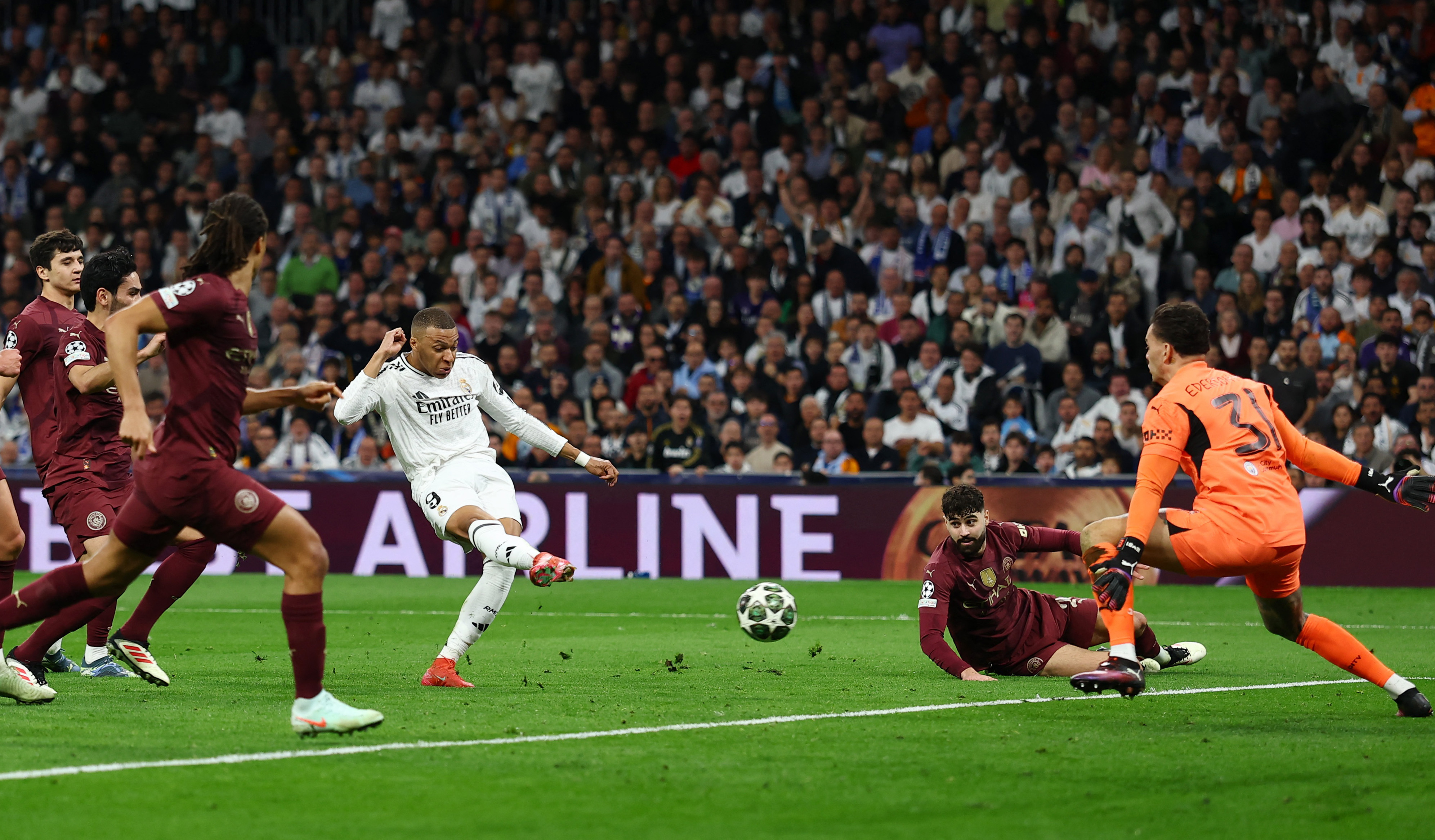 Real Madrid's Kylian Mbappe scores their second goal