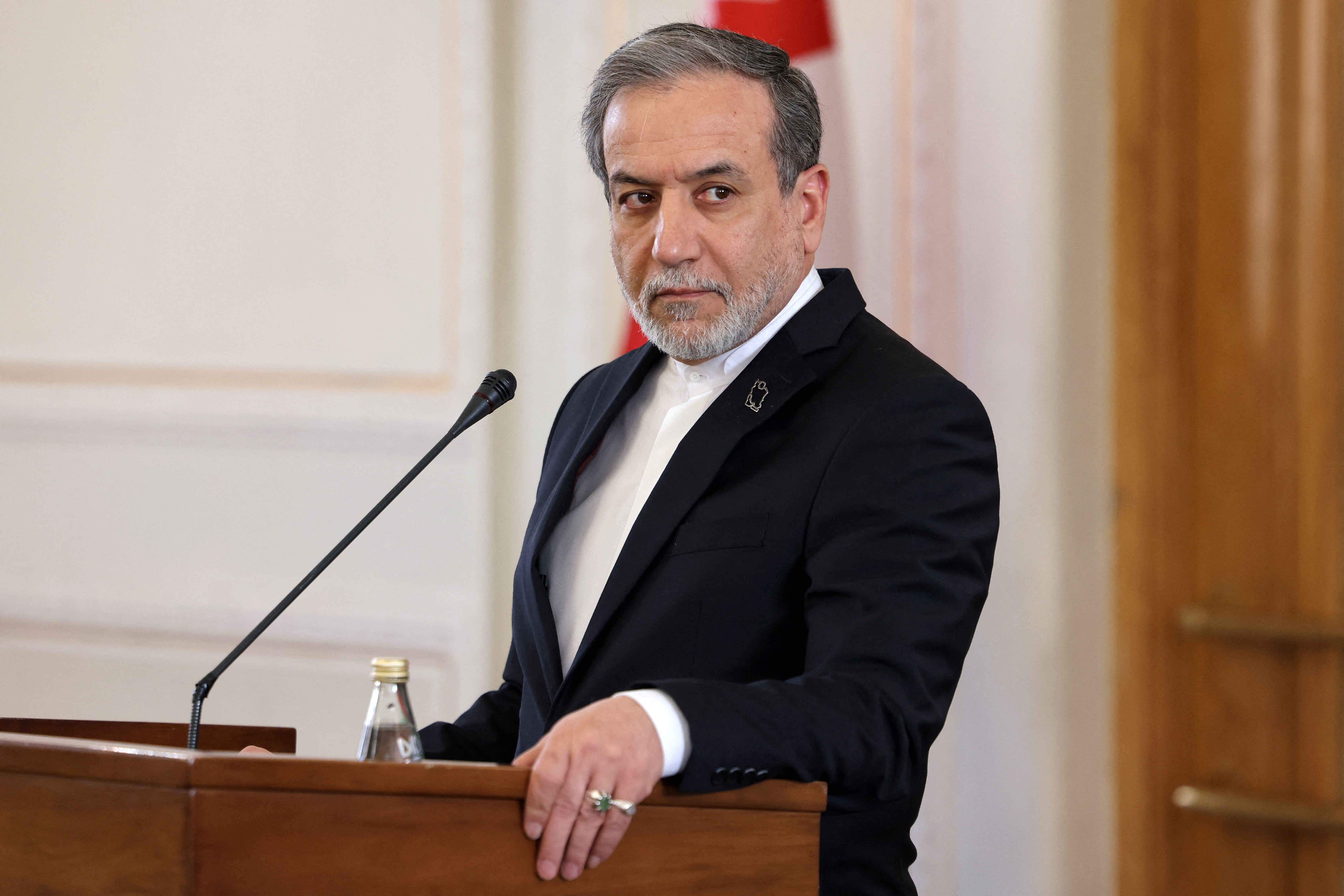 Iran's Foreign Minister Abbas Araghchi gives a joint press conference with the Omani Foreign Minister in Tehran on December 30, 2024. (Photo by ATTA KENARE / AFP)