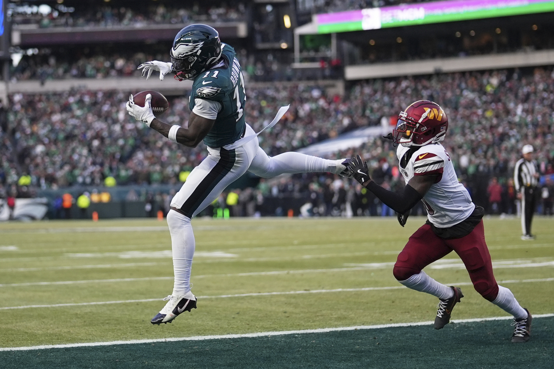 American football player make touchdown.