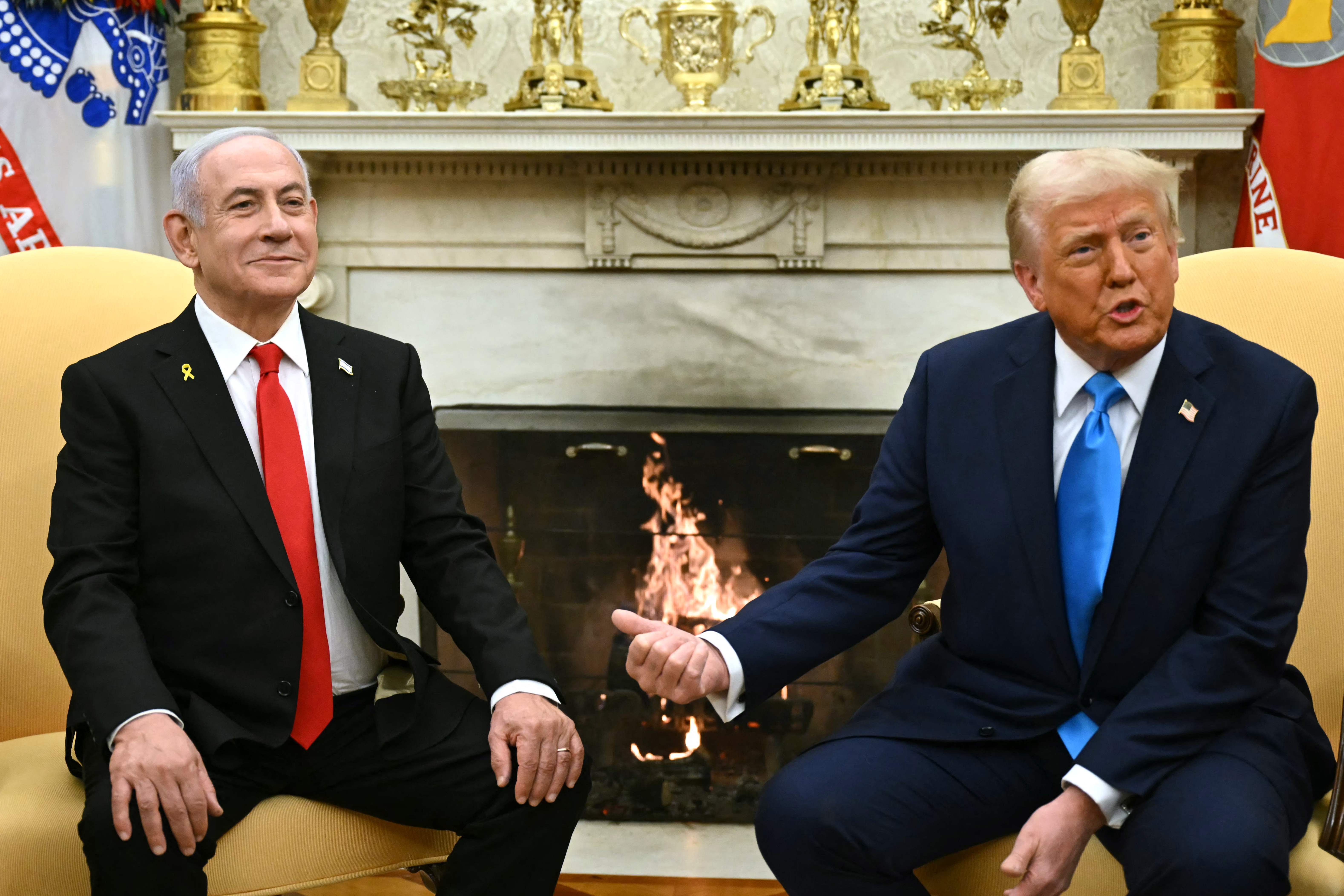 US President Donald Trump (R) meets with Israel's Prime Minister Benjamin Netanyahu in the Oval Office of the White House [File: ANDREW CABALLERO-REYNOLDS / AFP]