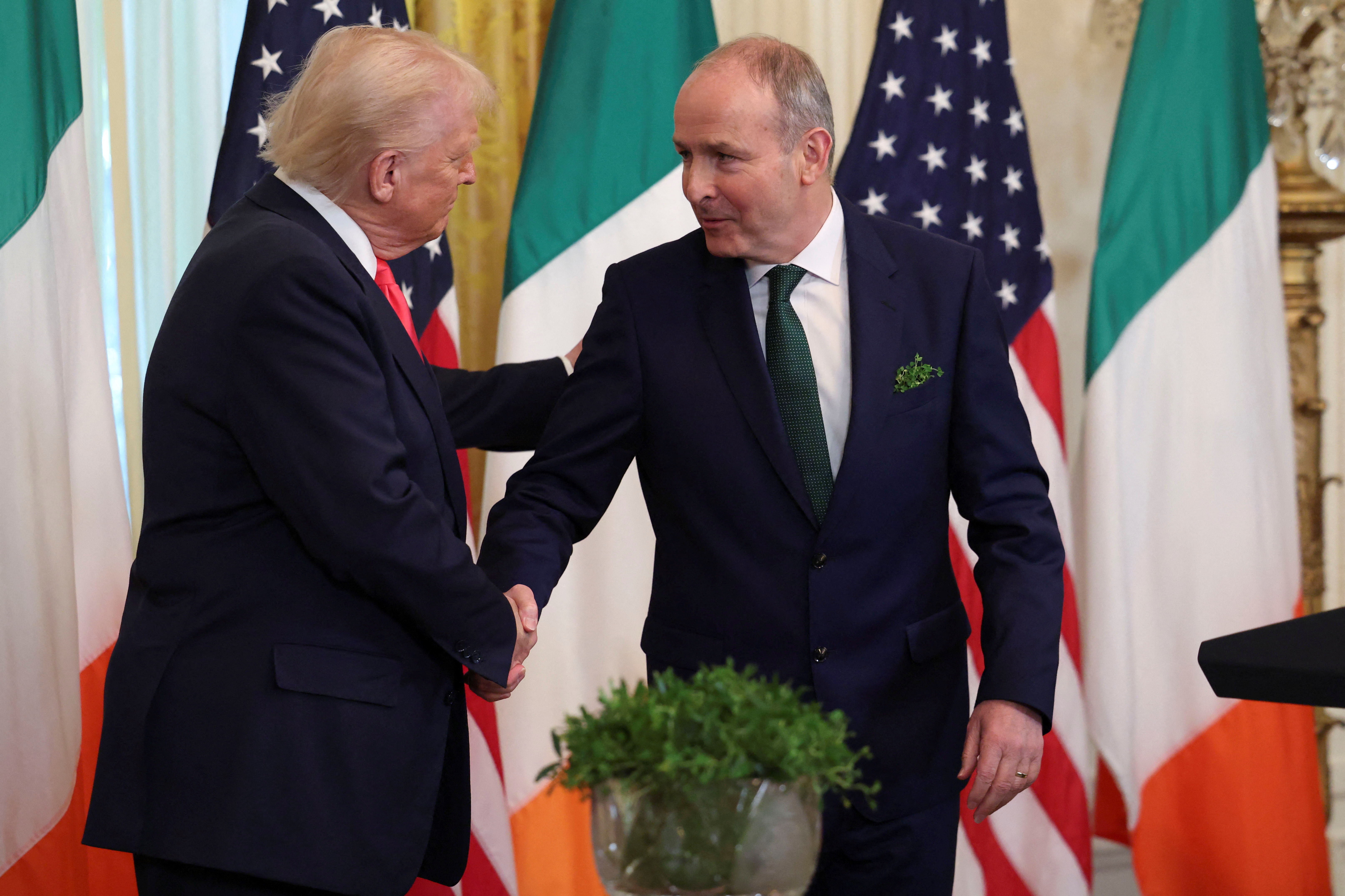 Trump shakes hands with Michael Martin.
