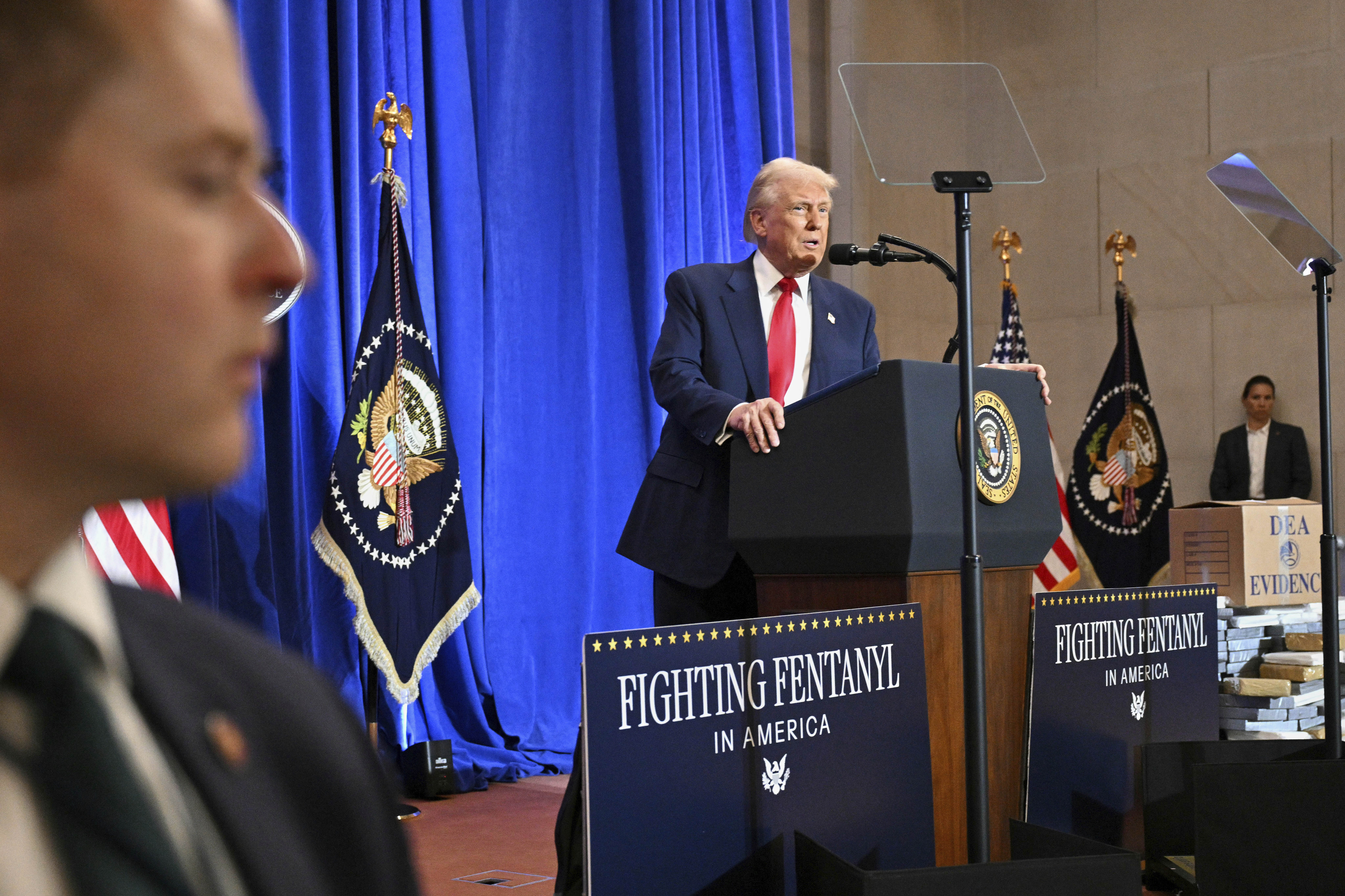 President Donald Trump speaks at the Justice Department in Washington, DC, on March 14 [Pool via AP]