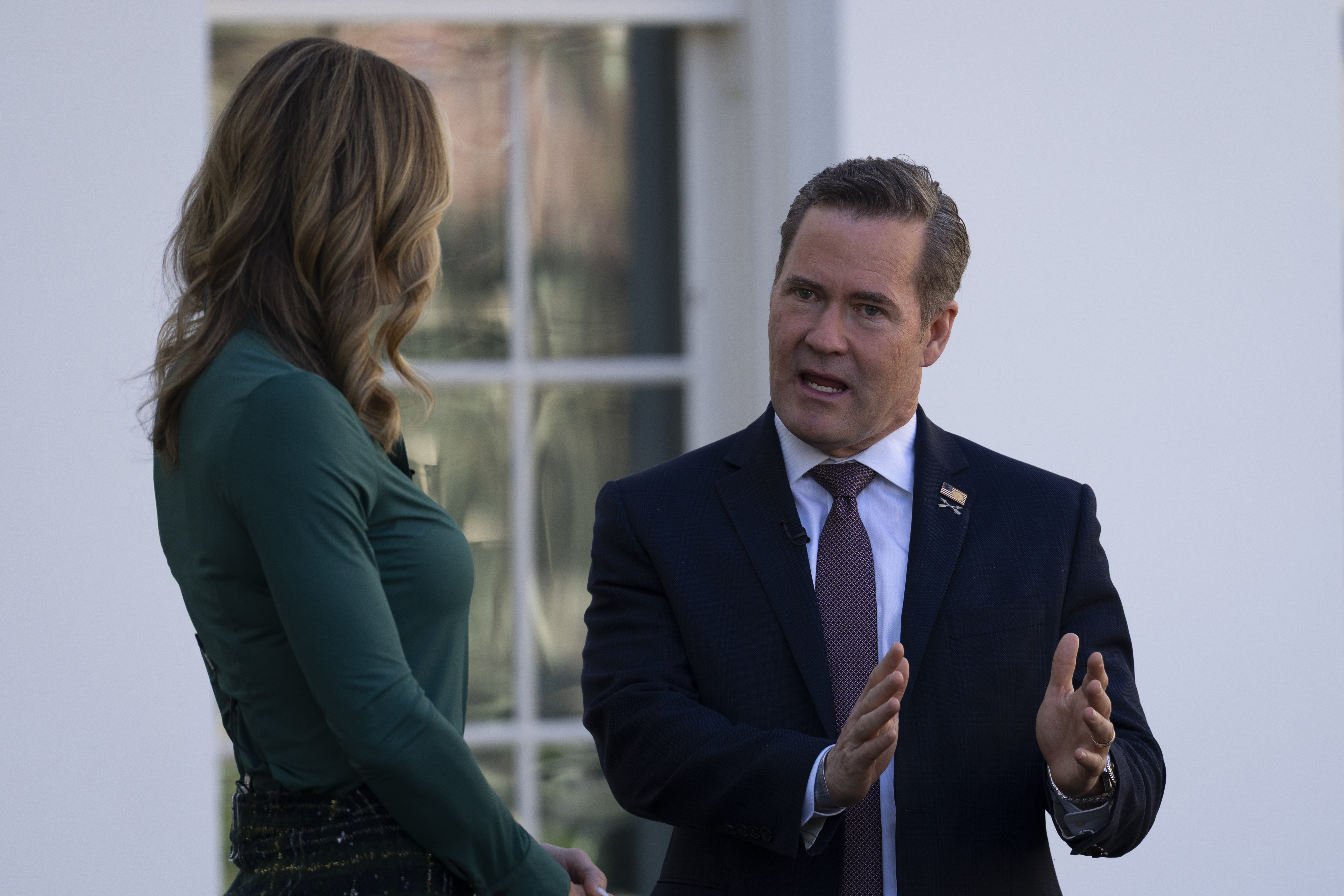 The White House national security adviser, Mike Waltz, speaks with Lara Trump, a Fox News host and President Donald Trump’s daughter-in-law, Lara Trump, on March 19