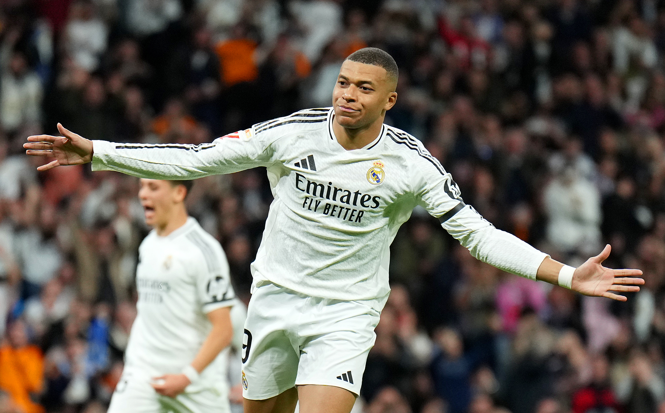 MADRID, SPAIN - MARCH 29: Kylian Mbappe of Real Madrid celebrates scoring his team's first goal from the penalty spot during the LaLiga match between Real Madrid CF and CD Leganes at Estadio Santiago Bernabeu on March 29, 2025 in Madrid, Spain. (Photo by Angel Martinez/Getty Images)