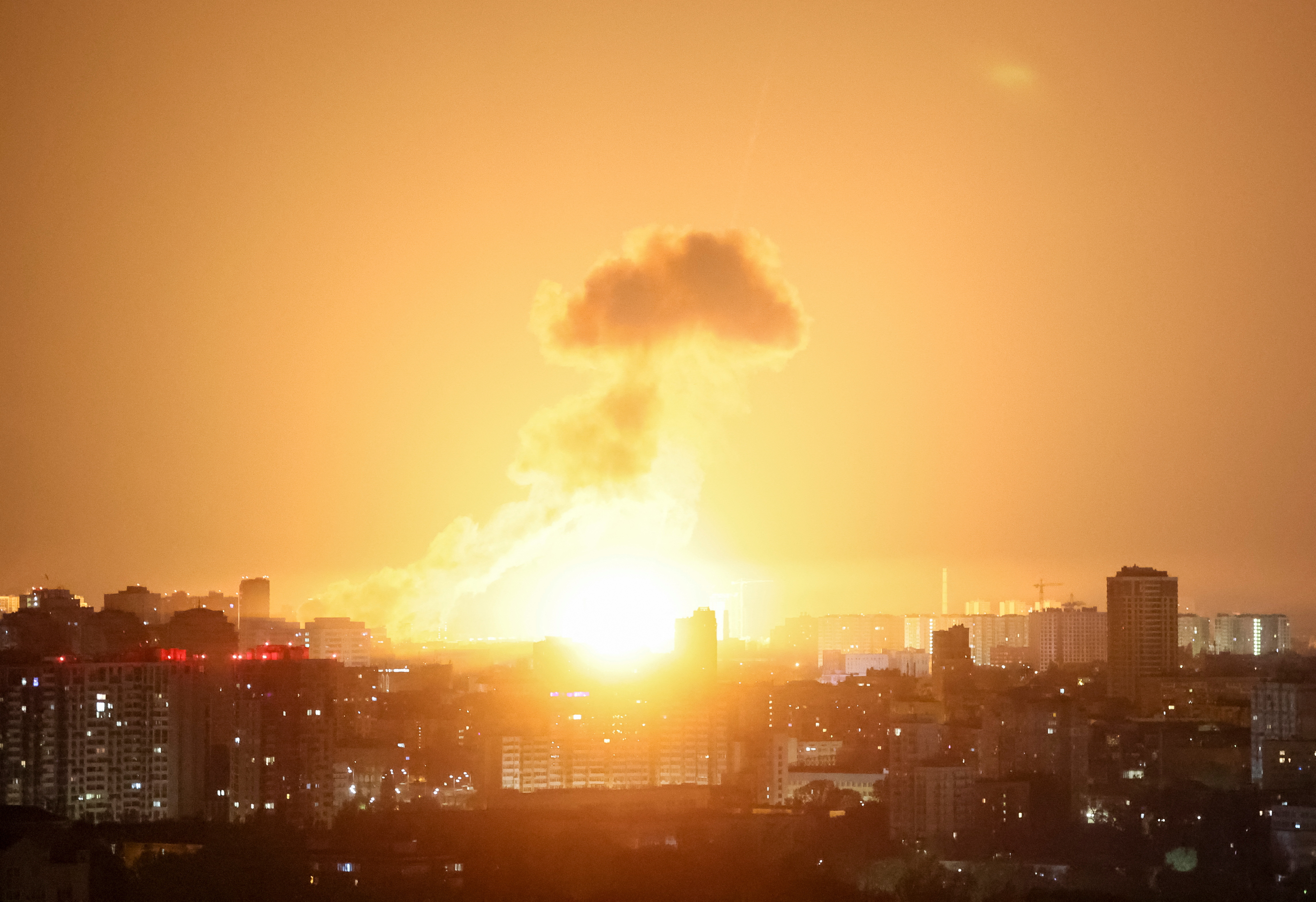 An explosion of a ballistic missile lights up the sky over the city during a Russian missile and drone strike, amid Russia's attack on Ukraine, in Kyiv, Ukraine April 24, 2025. [File: Gleb Garanich/Reuters]