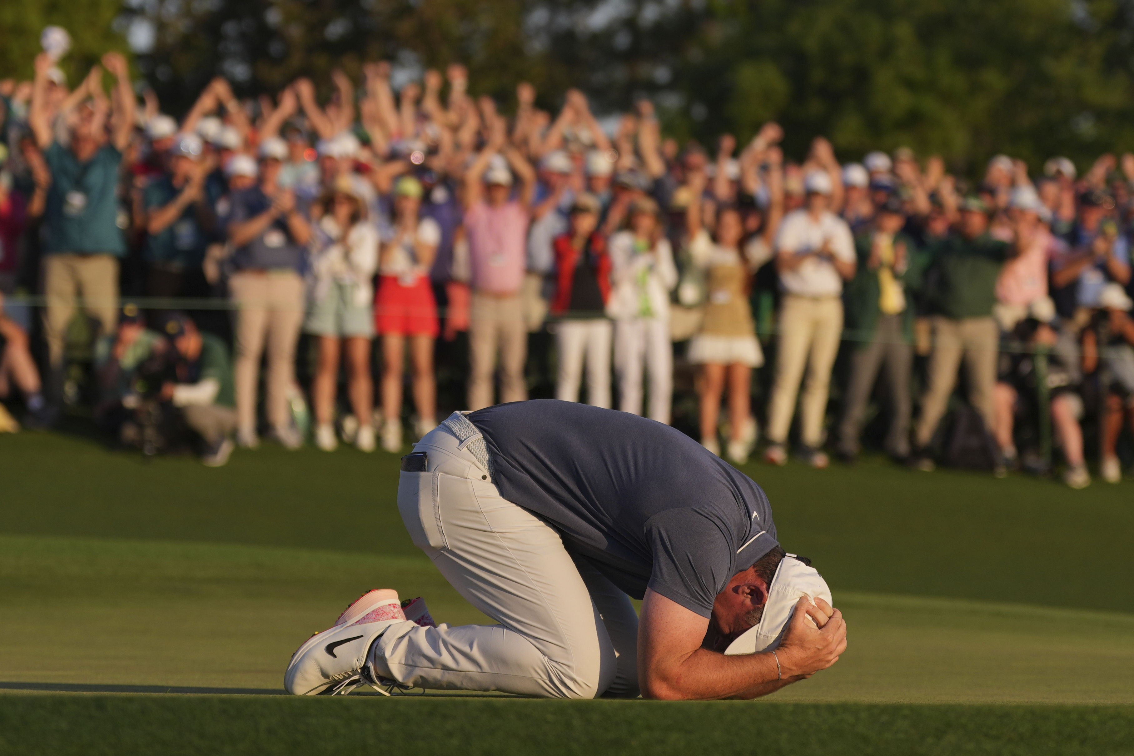 Rory McIlroy, of Northern Ireland, celebrates winning in a playoff against Justin Rose, of England, after the final round the Masters golf tournament, Sunday, April 13, 2025, in Augusta, Georgia, US