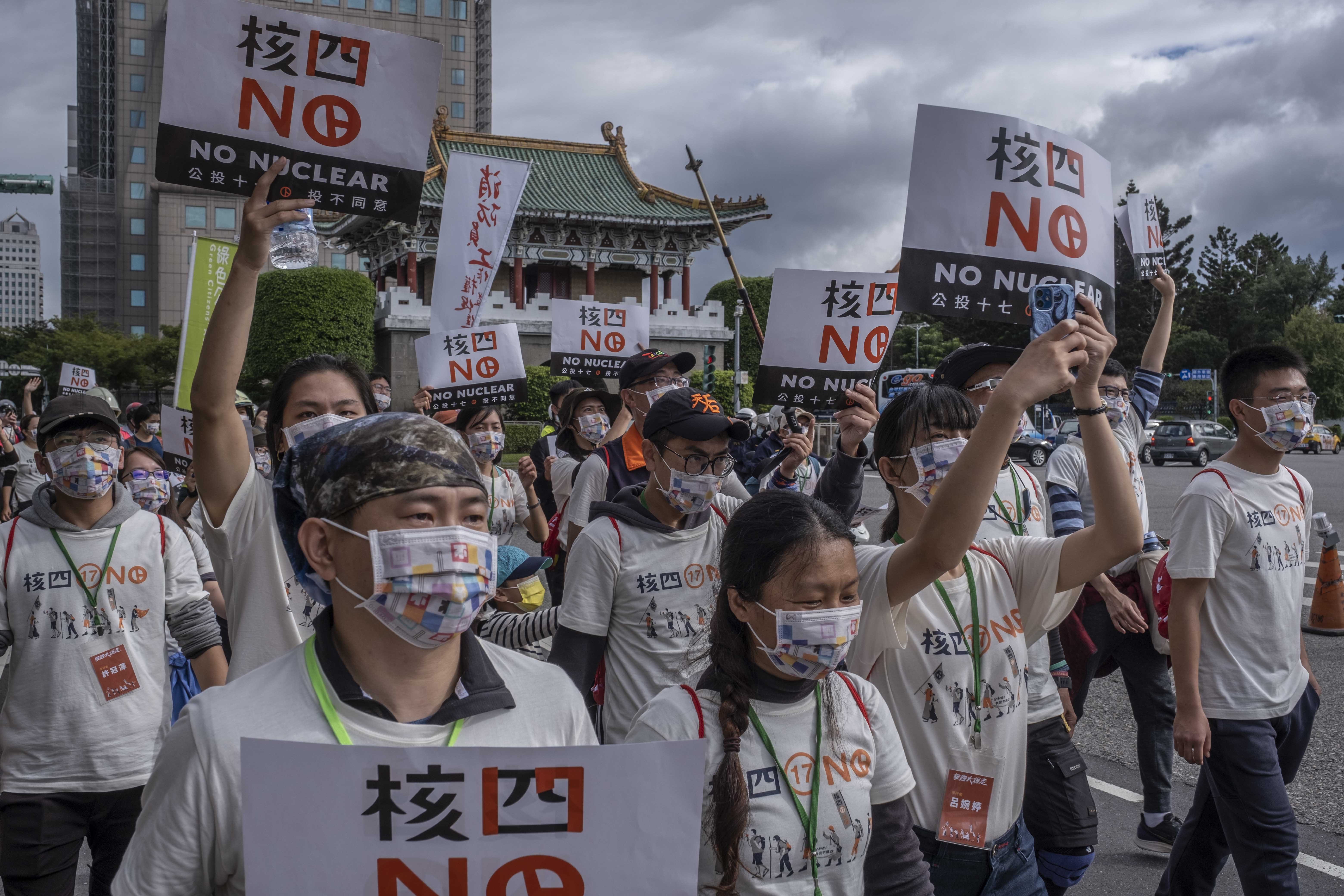 Protesters demonstrate against proposals to restart construction of the Longmen Nuclear Power Plant in Taipei, Taiwan, on December 4, 2021