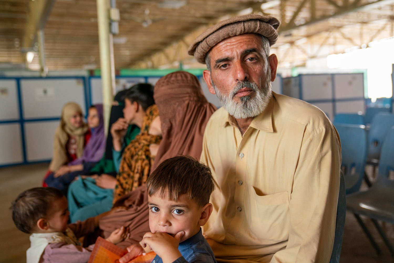 A man with his wife and children.