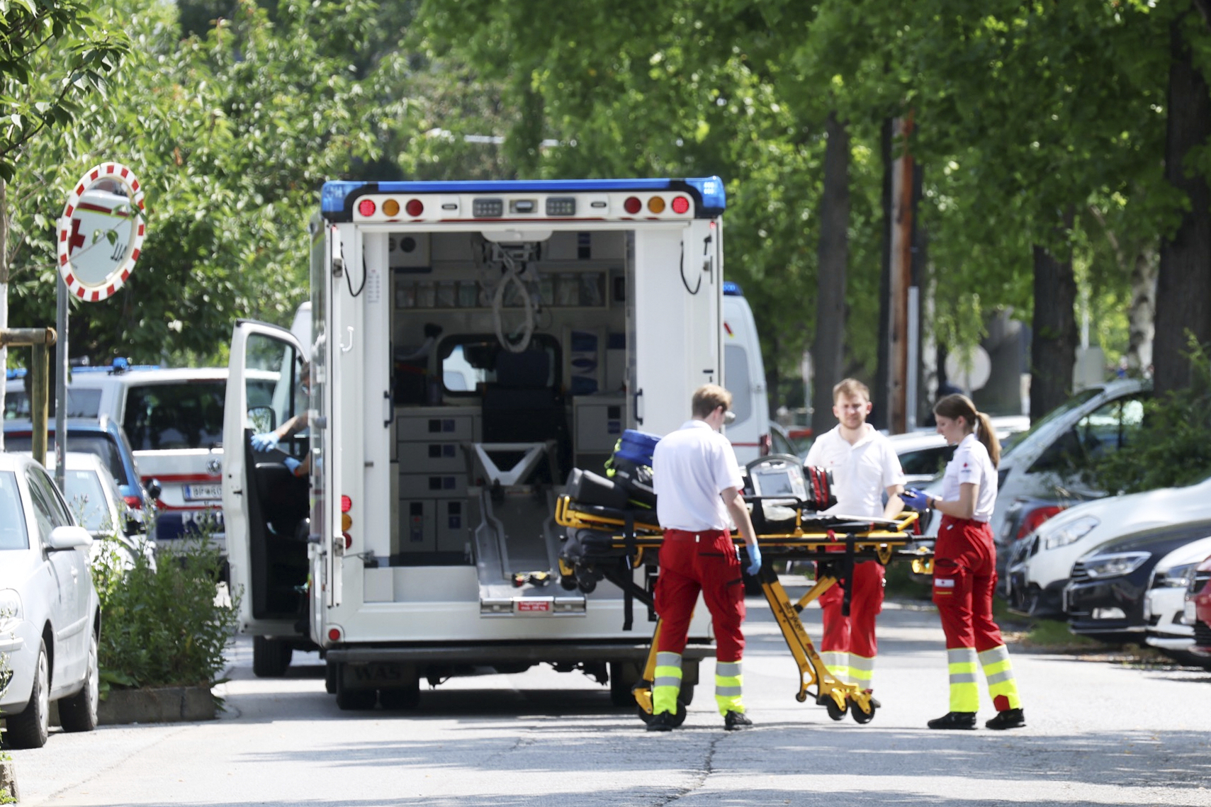 Rescue service personnel attend the scene of a shooting at a school in Graz