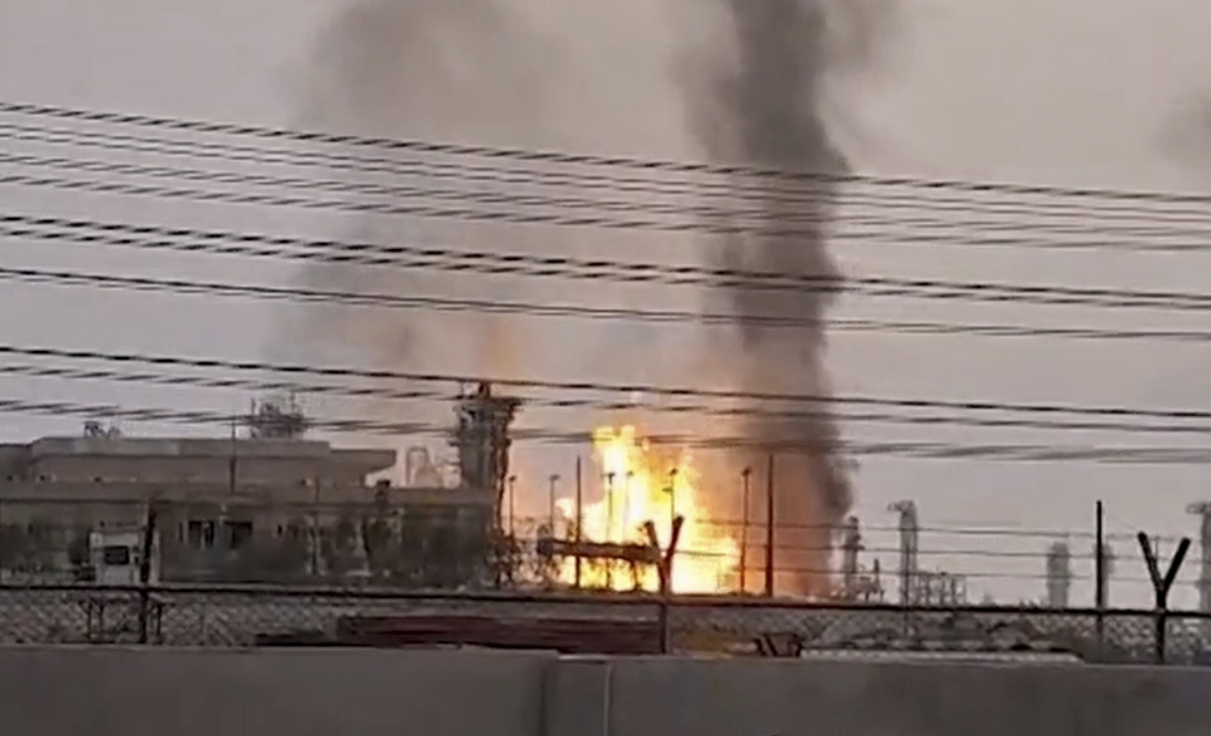 This screengrab taken from Islamic Republic of Iran Broadcasting shows a refinery in Iran's South Pars gasfield after an Israeli drone struck it