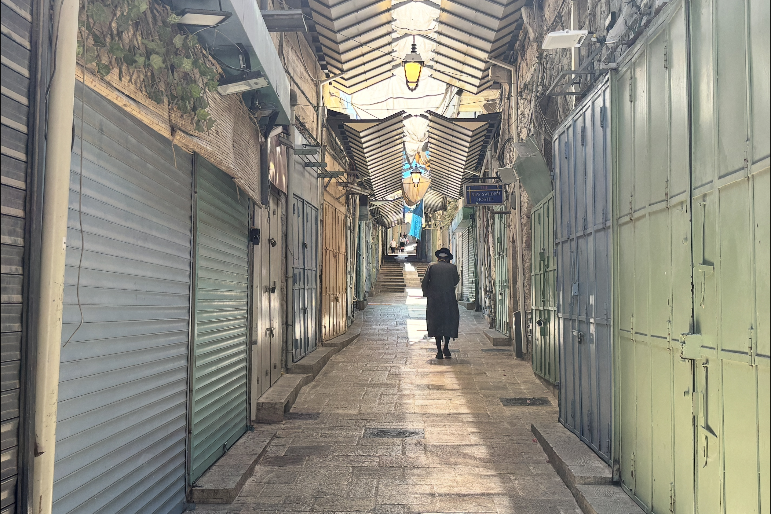 The streets of Old Jerusalem’s Christian and Muslim quarters are empty after shops and businesses were closed by Israeli authorities, citing ‘security concerns’ during the 12-day conflict with Iran [Al Jazeera]