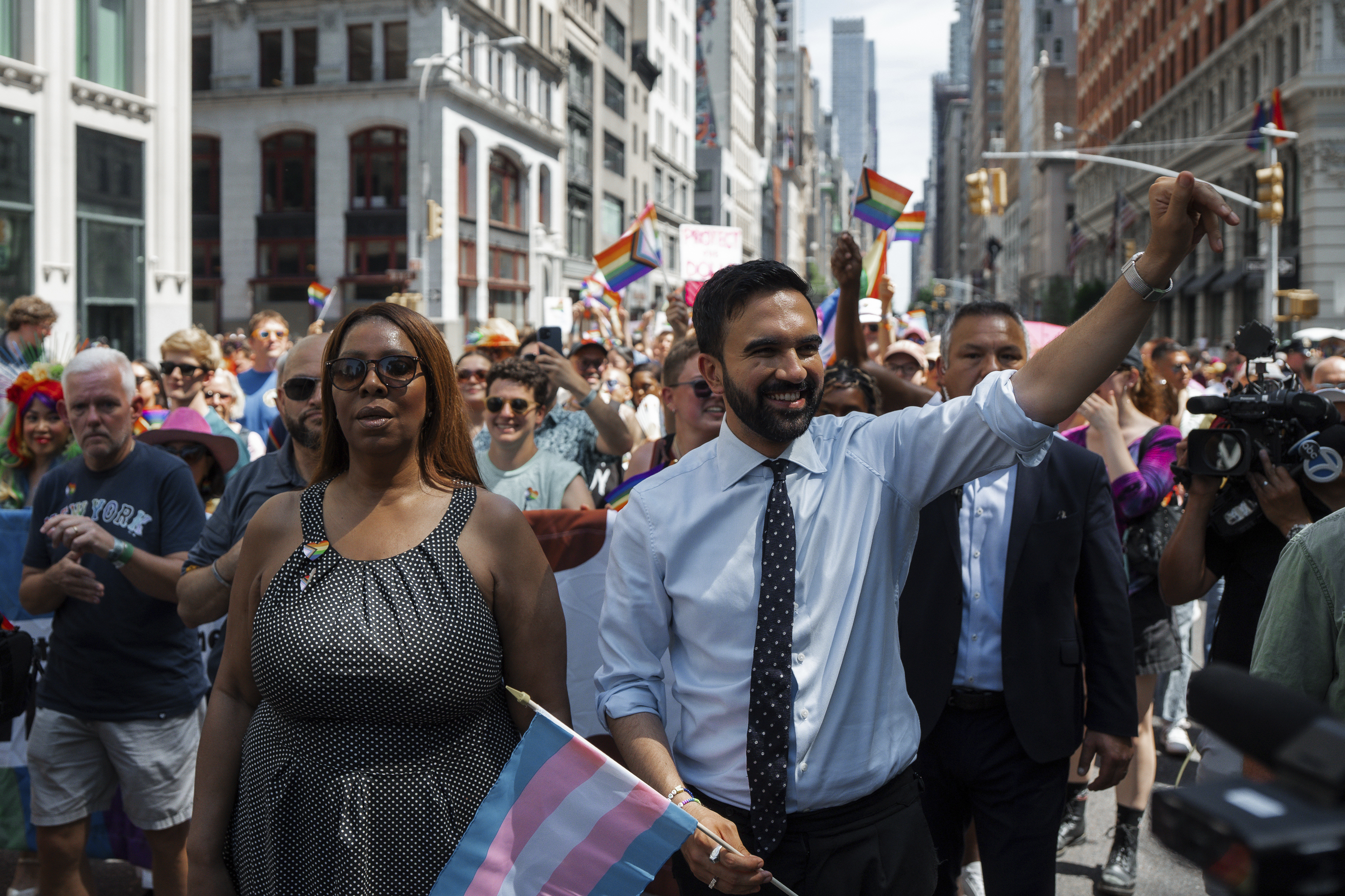 Zohran Mamdani walks alongside New York Attorney General Letitia James at New York’s Pride Parade on June 29
