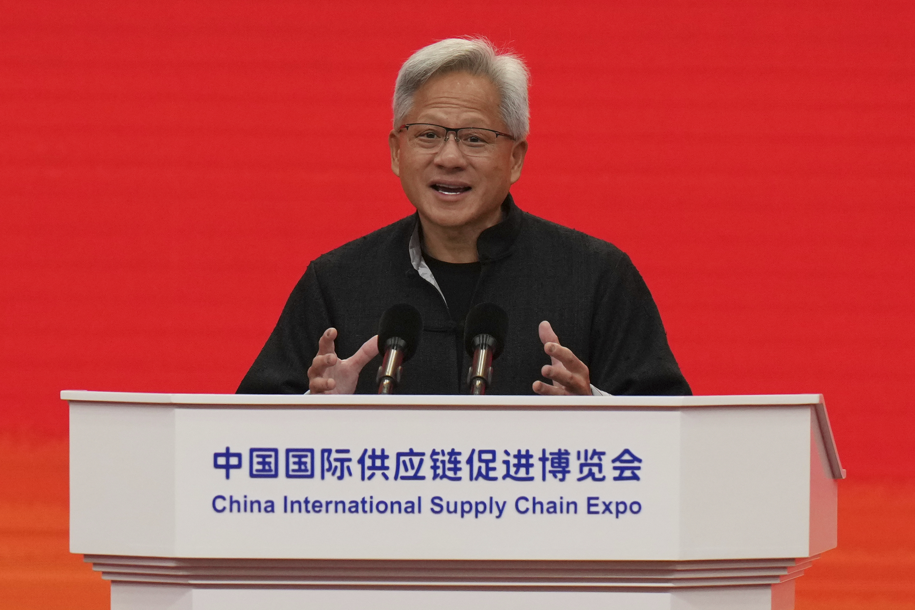 CEO of Nvidia Jensen Huang gestures as he speaks on stage during the opening ceremony of the third China International Supply Chain Expo, in Beijing on July 16, 2025.