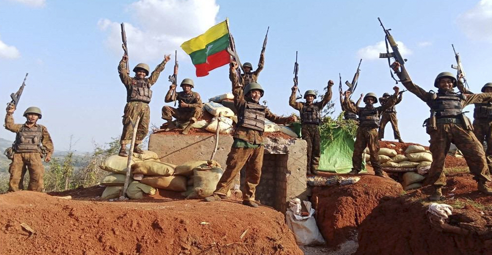 Soldiers are seen celebrating a victory at one of the captured outposts.