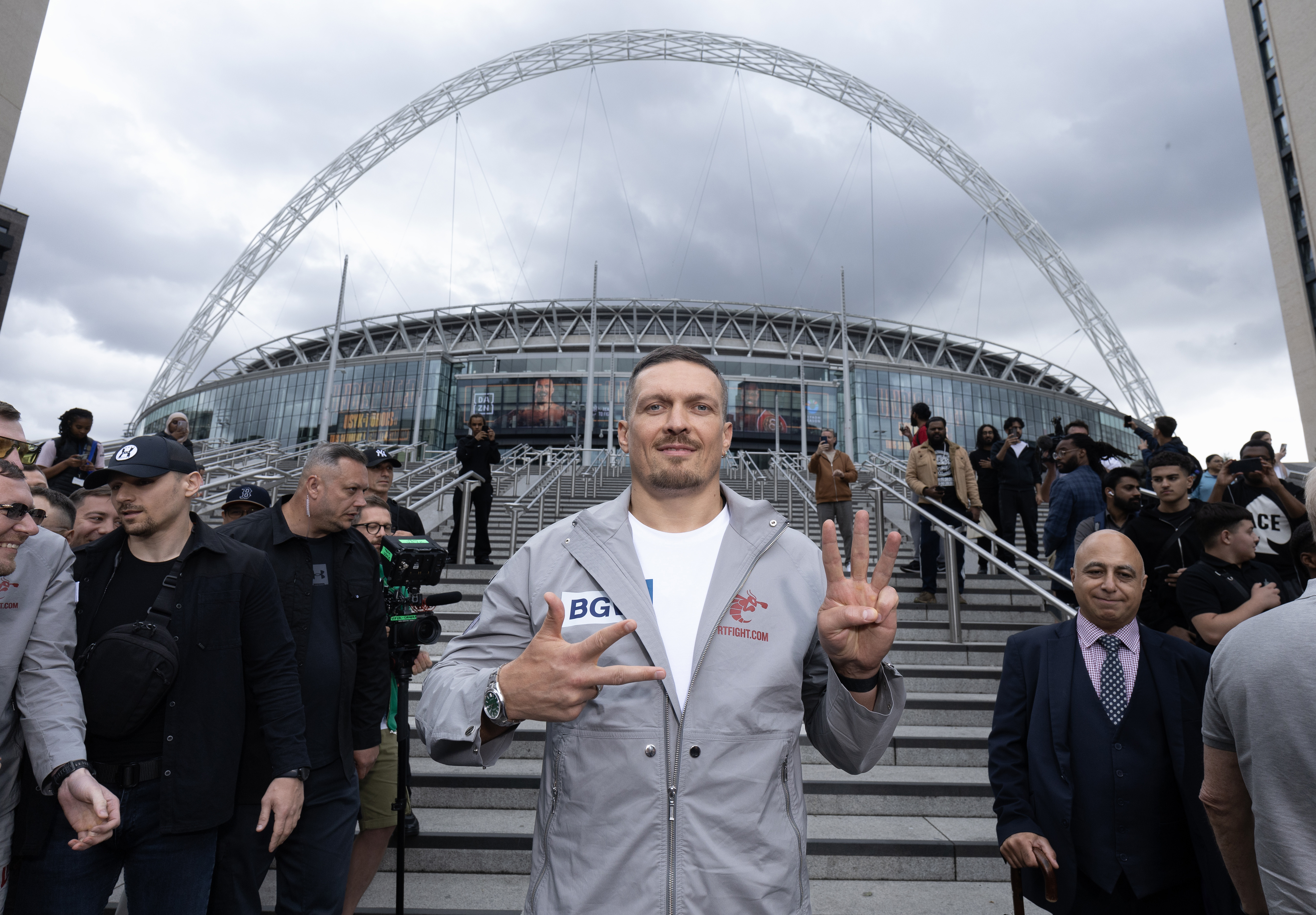 Usyk poses in front of Wembley Stadium on July 15, 2025, in London, England, UK