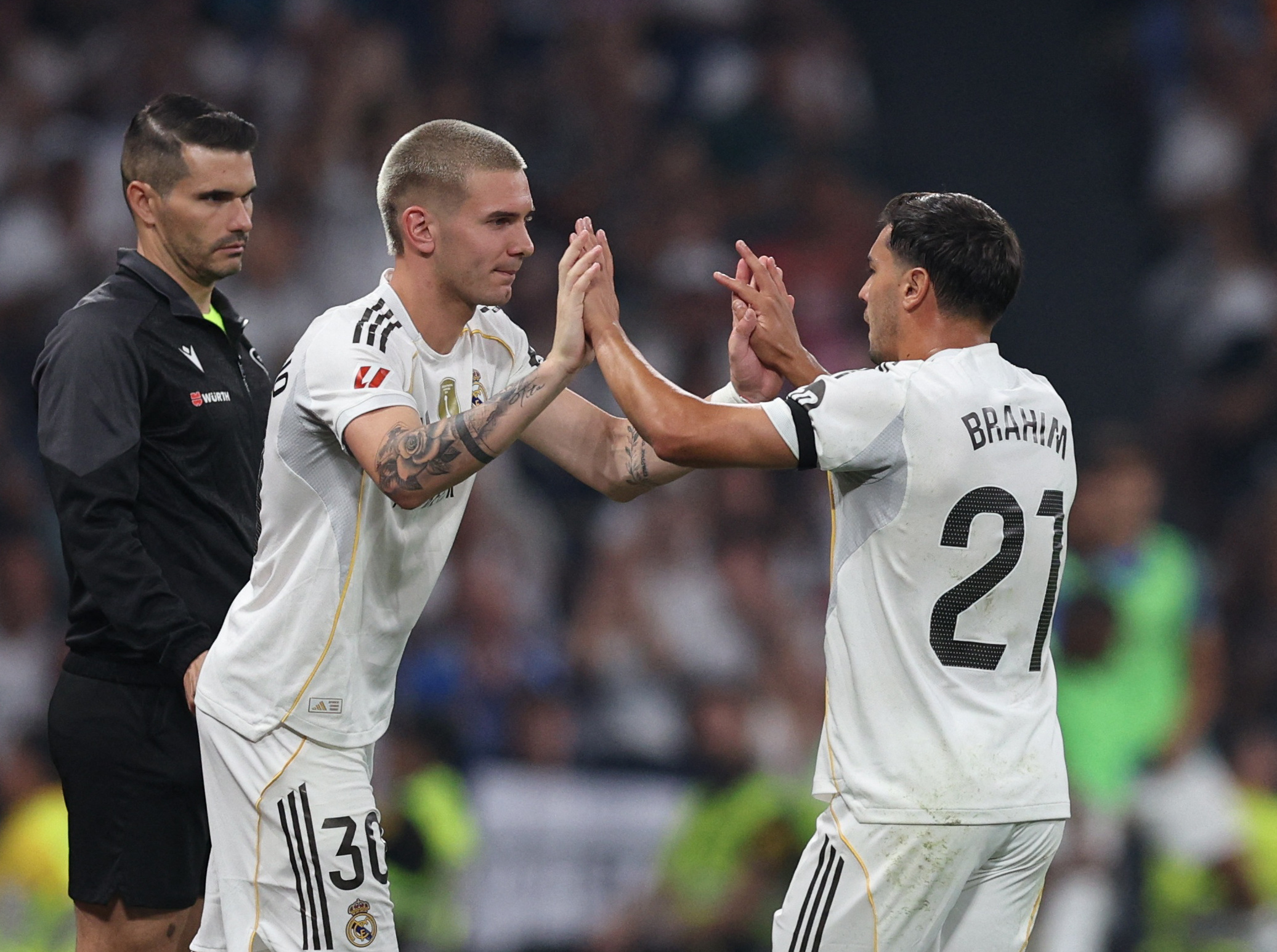Real Madrid's Franco Mastantuono comes on as a substitute to replace Real Madrid's Brahim Diaz