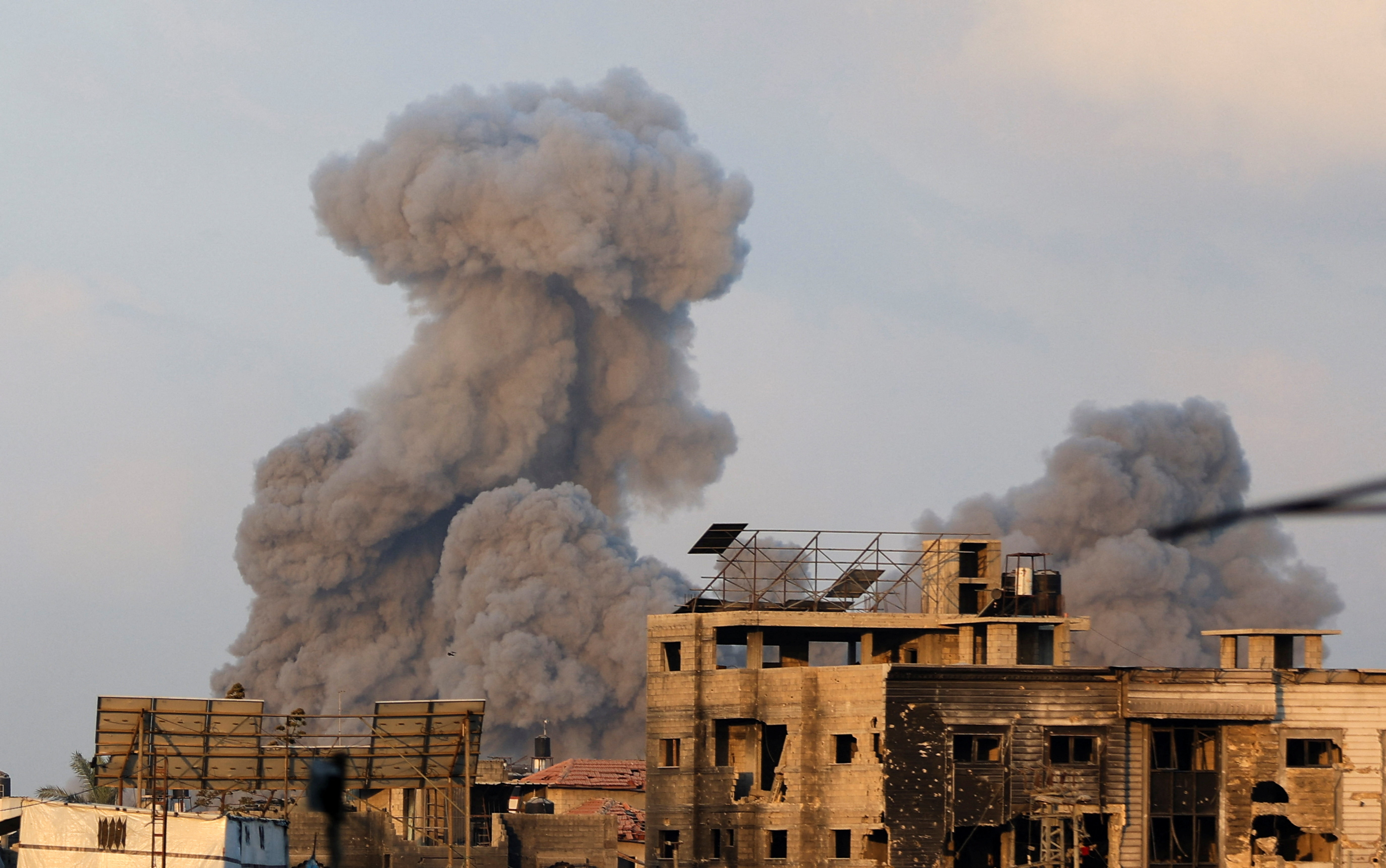 Smoke rises following an Israeli strike, in Gaza City.