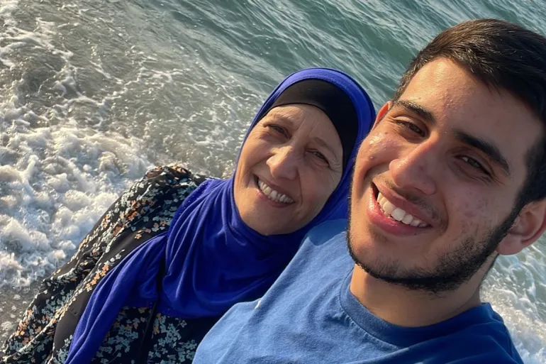 Saif visits a beach with his aunt, Nihad [Courtesy of family]