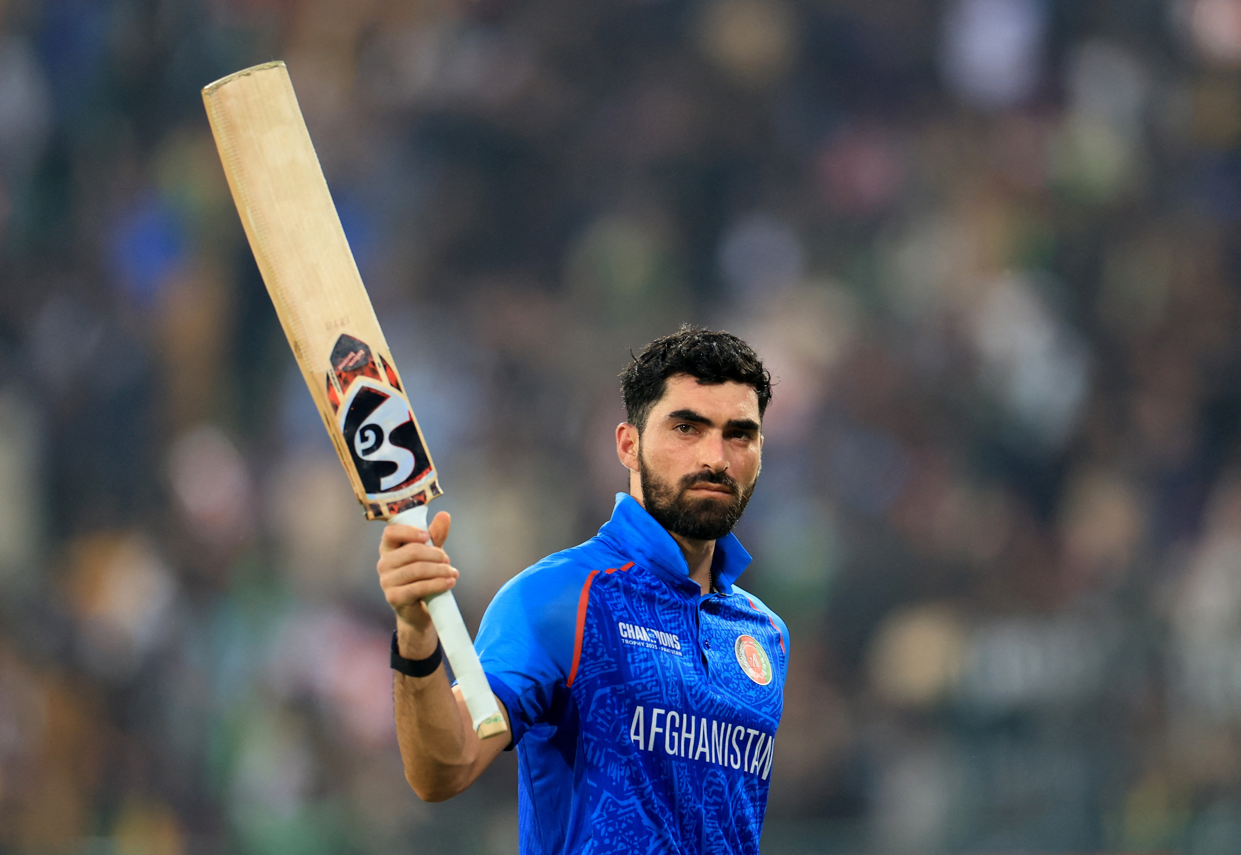Afghanistan's Ibrahim Zadran acknowledges the crowd