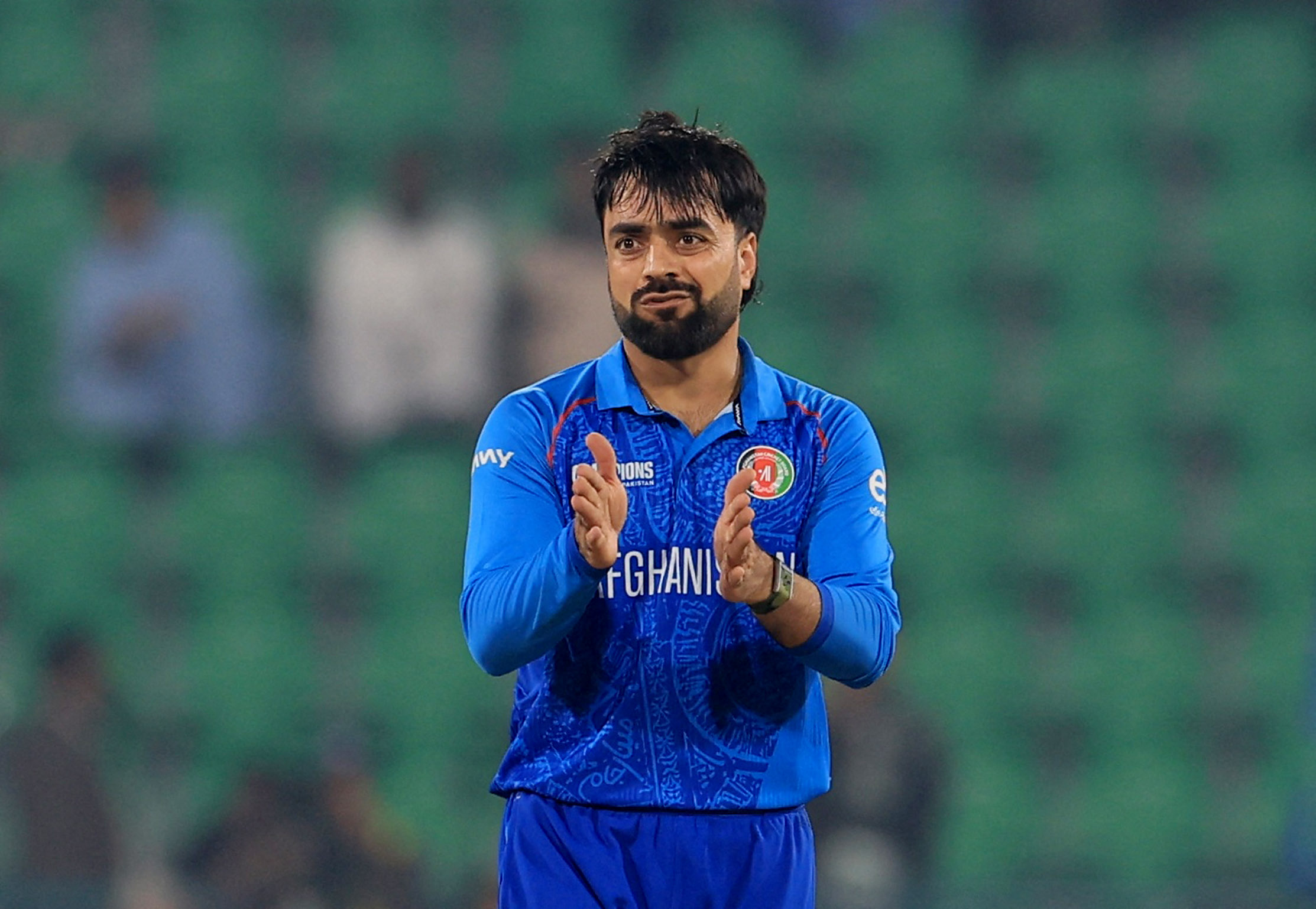 Afghanistan's Rashid Khan reacts