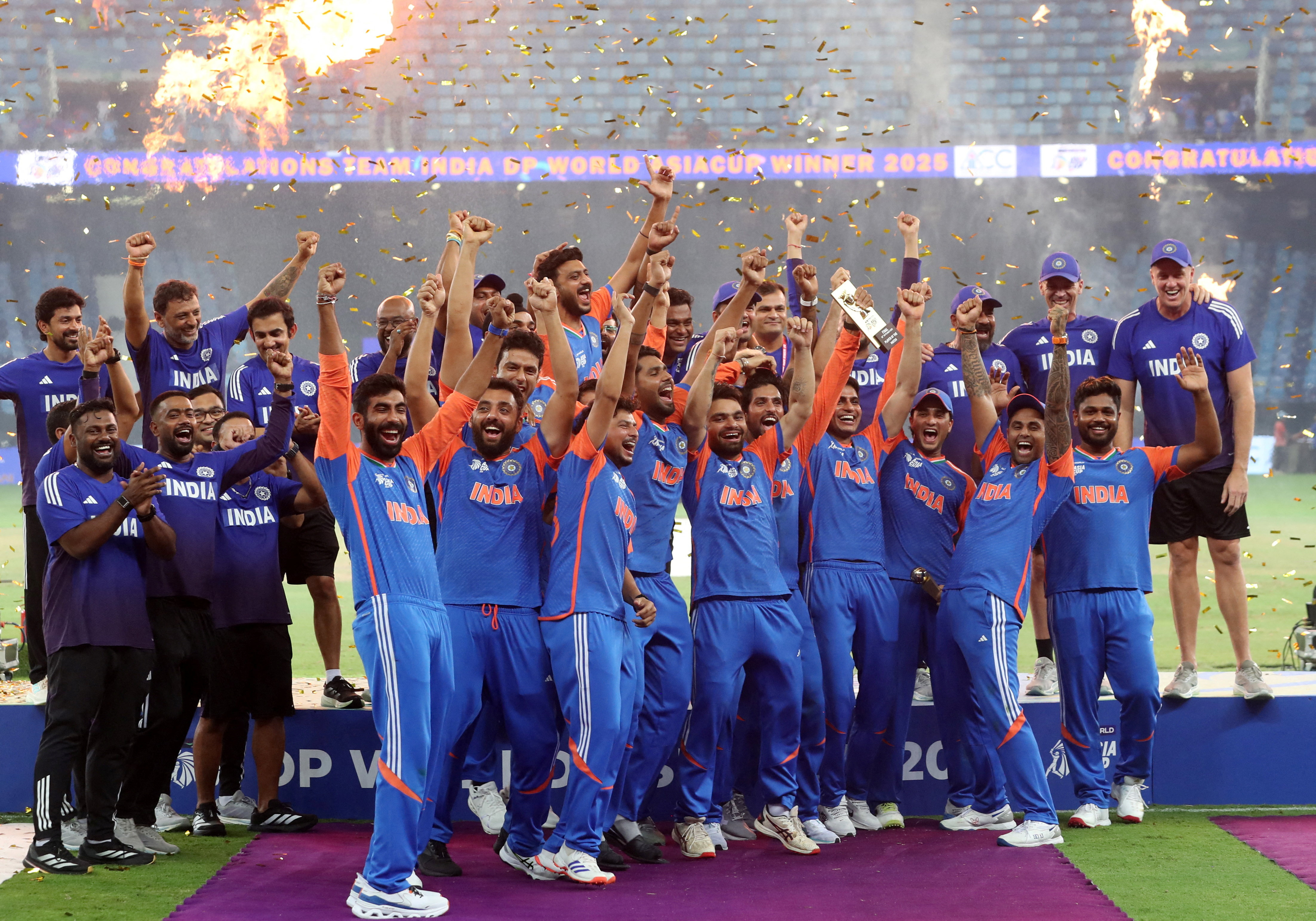 India players celebrate winning the Asia Cup during the presentation ceremony.